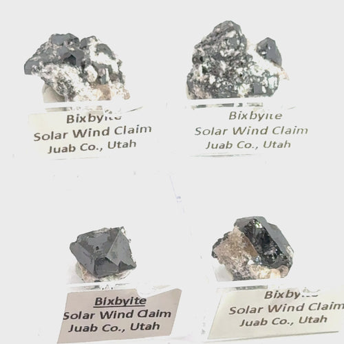 Bixbyite Gemstone grouping on white front view video