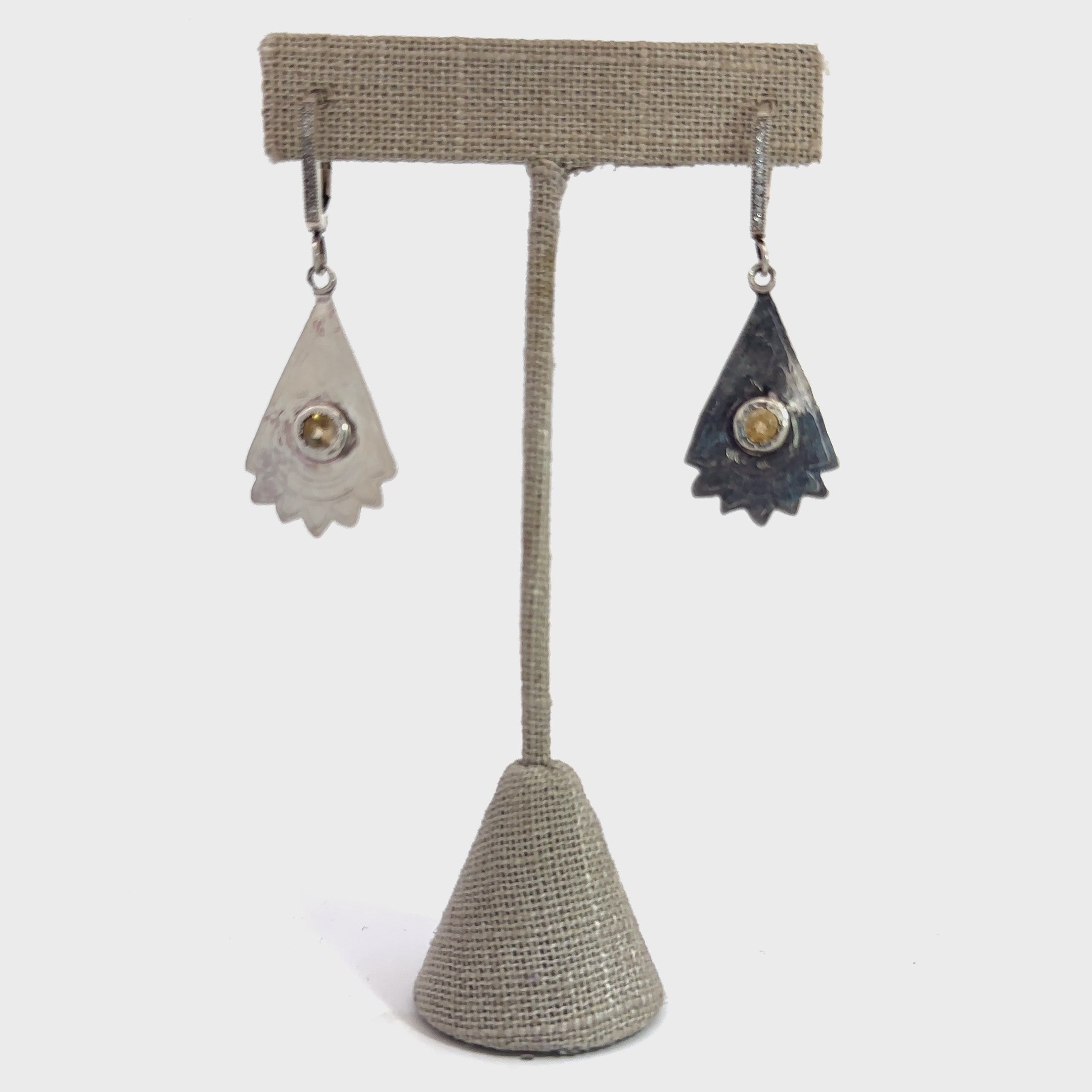 Citrine Gemstone Earrings on white resting on gemstone front overview video