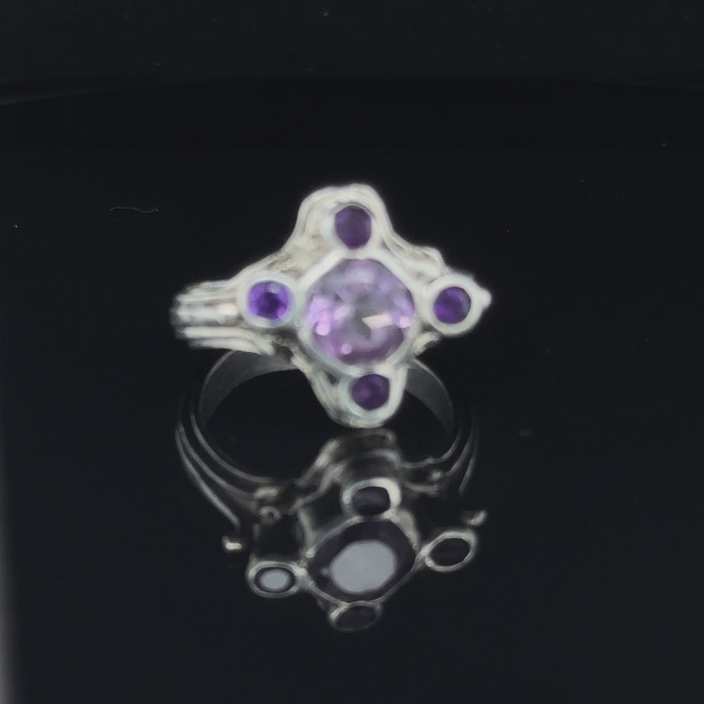 One‑of‑a‑kind artisan Amethyst ring handcrafted in sterling silver on black video view
