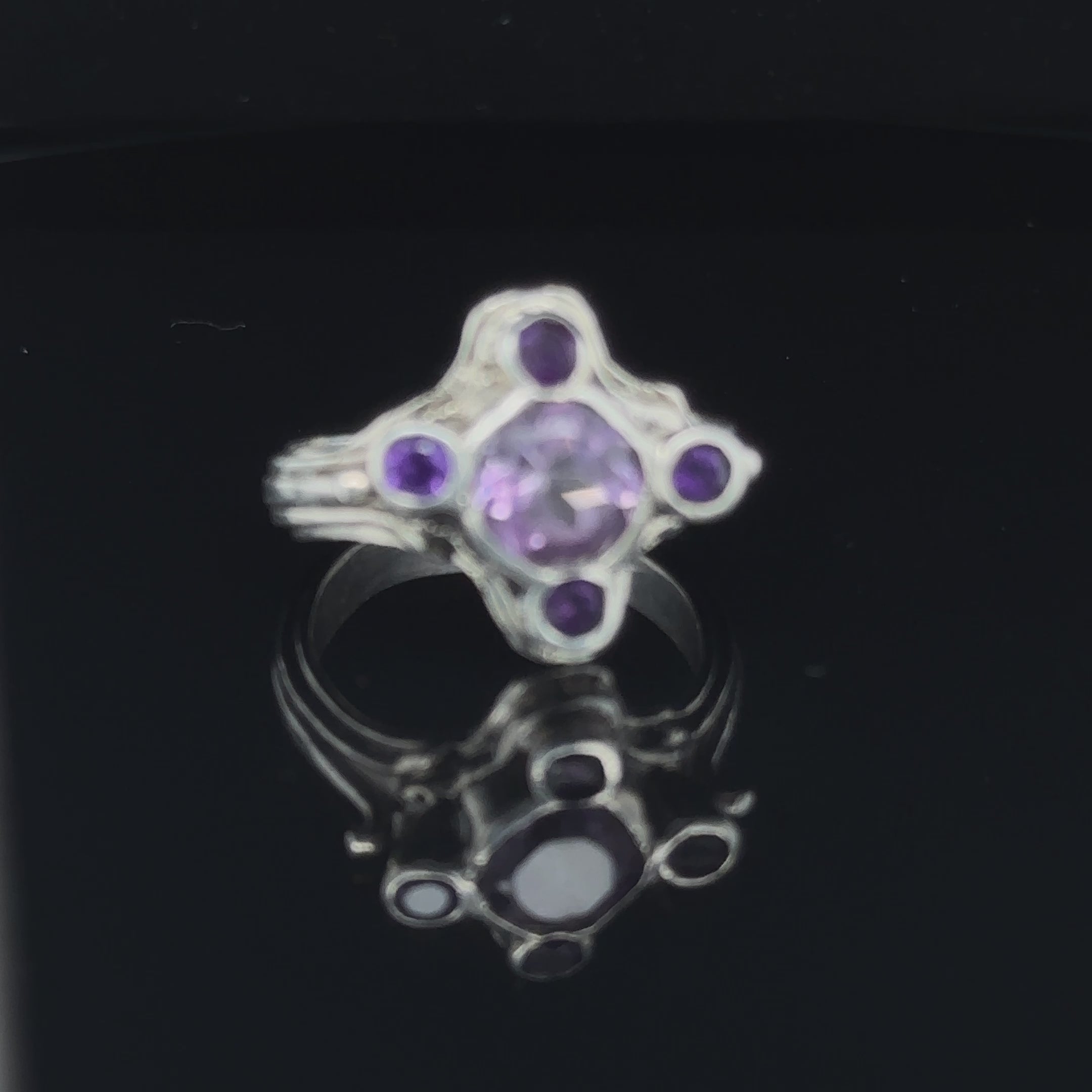 One‑of‑a‑kind artisan Amethyst ring handcrafted in sterling silver on black video view