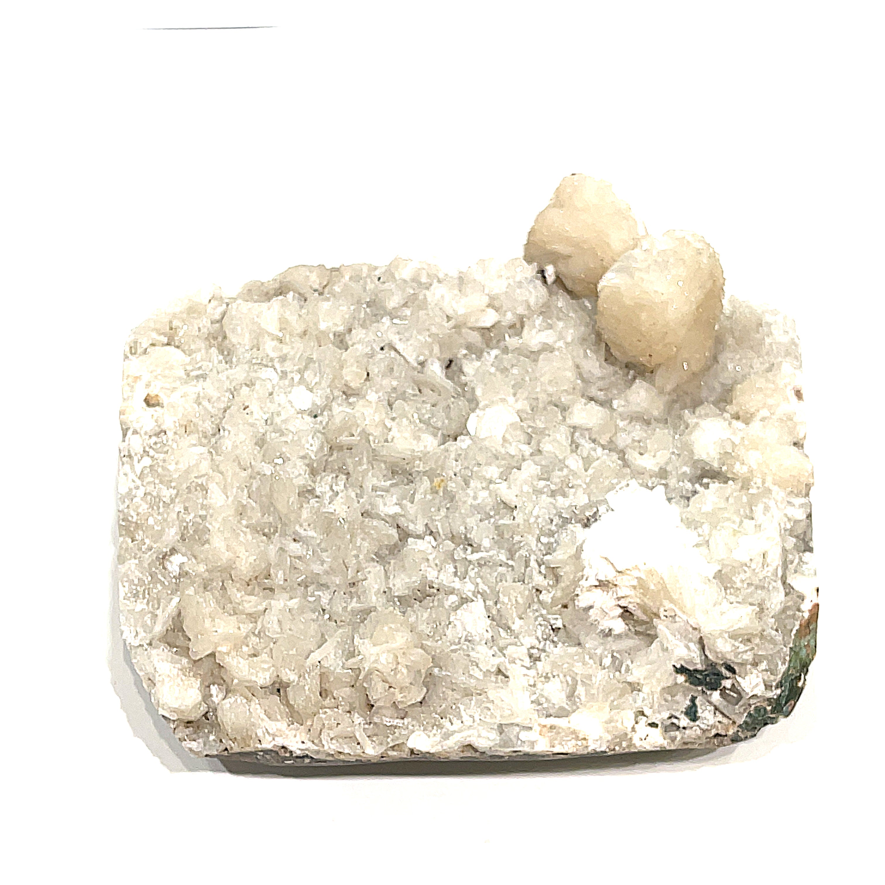 #10 Peach Stilbite on a white background, front view.