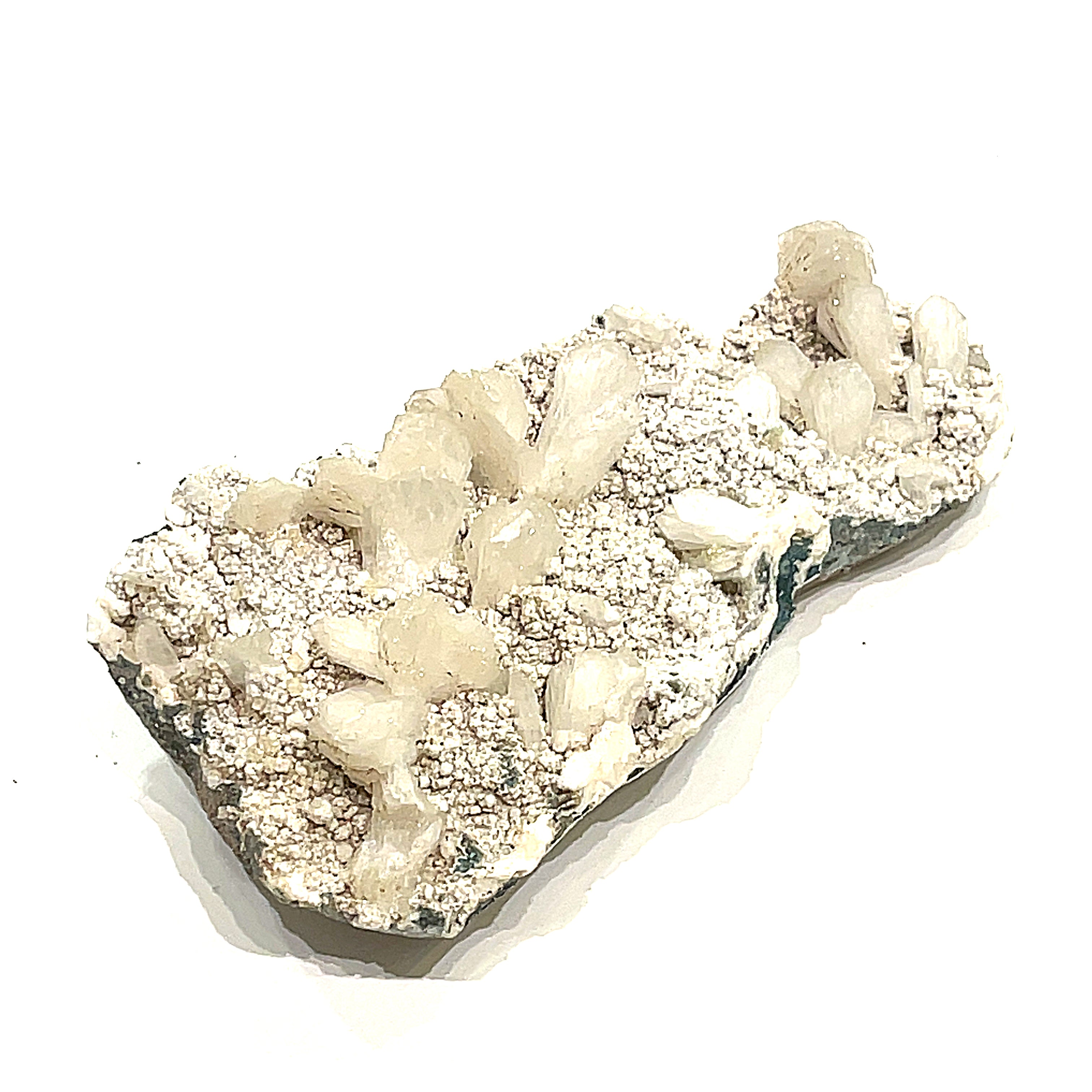 #11 Stilbite on a white background, front view.