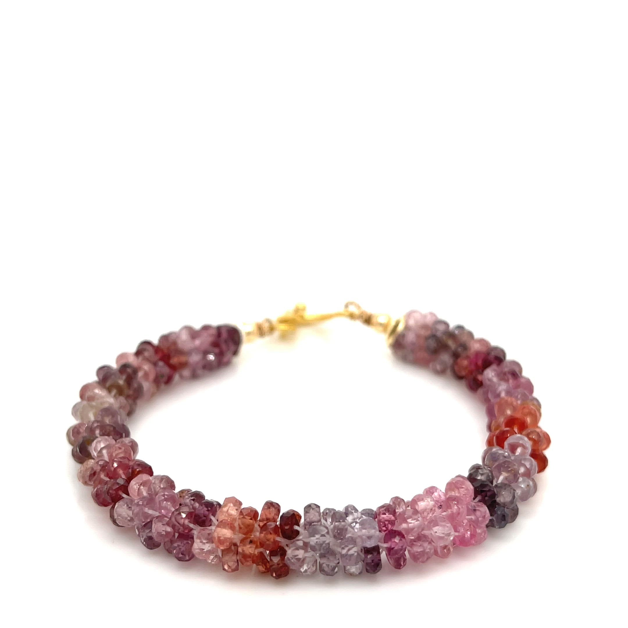 Red Spinel gemstone bracelet with gold-filled toggle — handcrafted by Hidden Jewel Boston on a white background front and center overview. video