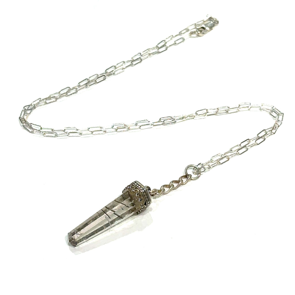 #1 Rutilated Quartz pendants on a Sterling Silver chain necklace with intricate designs on the bezel caps on a white background, center view.