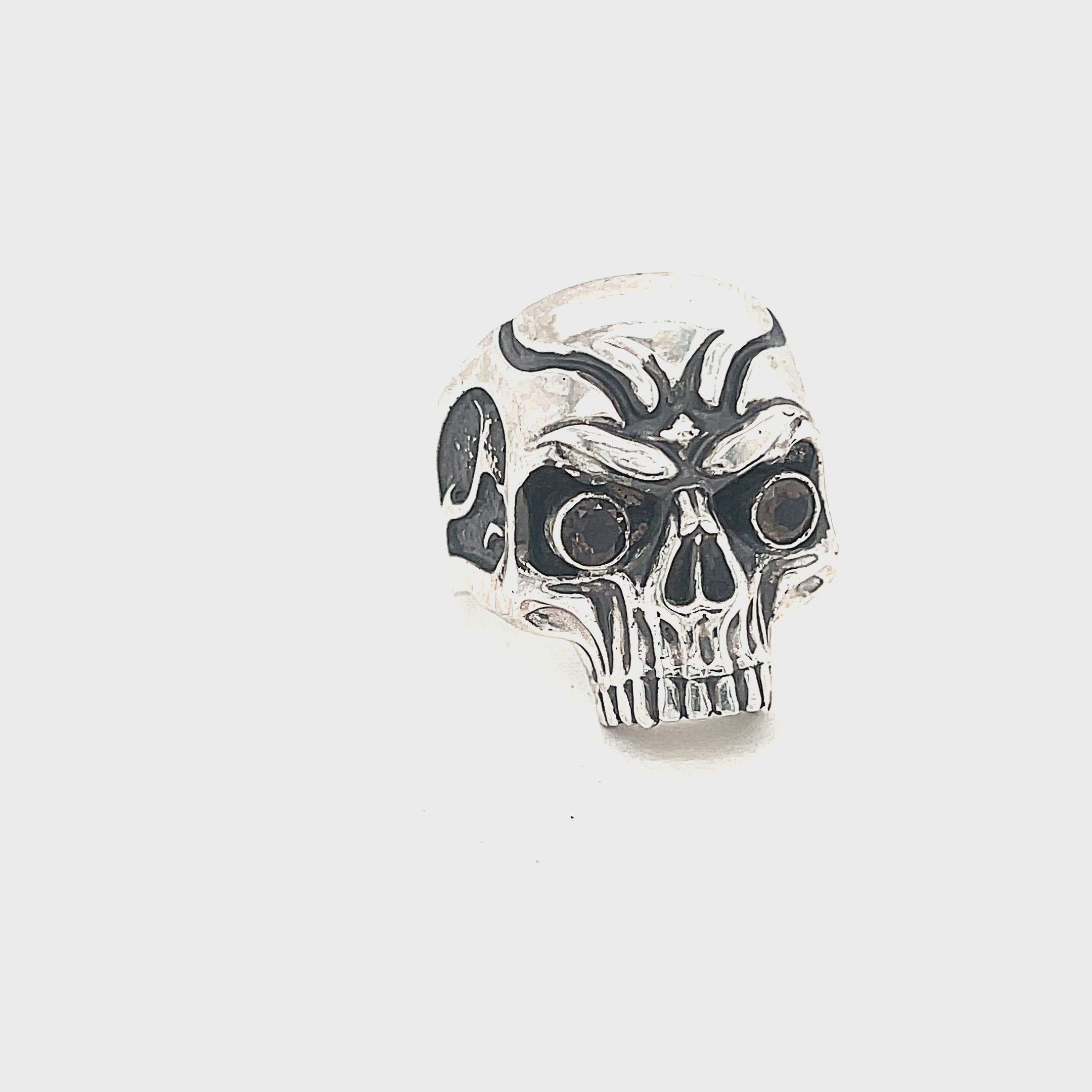 Custom CAD-designed silver skull ring — artisan men’s jewelry on a white background front view video
