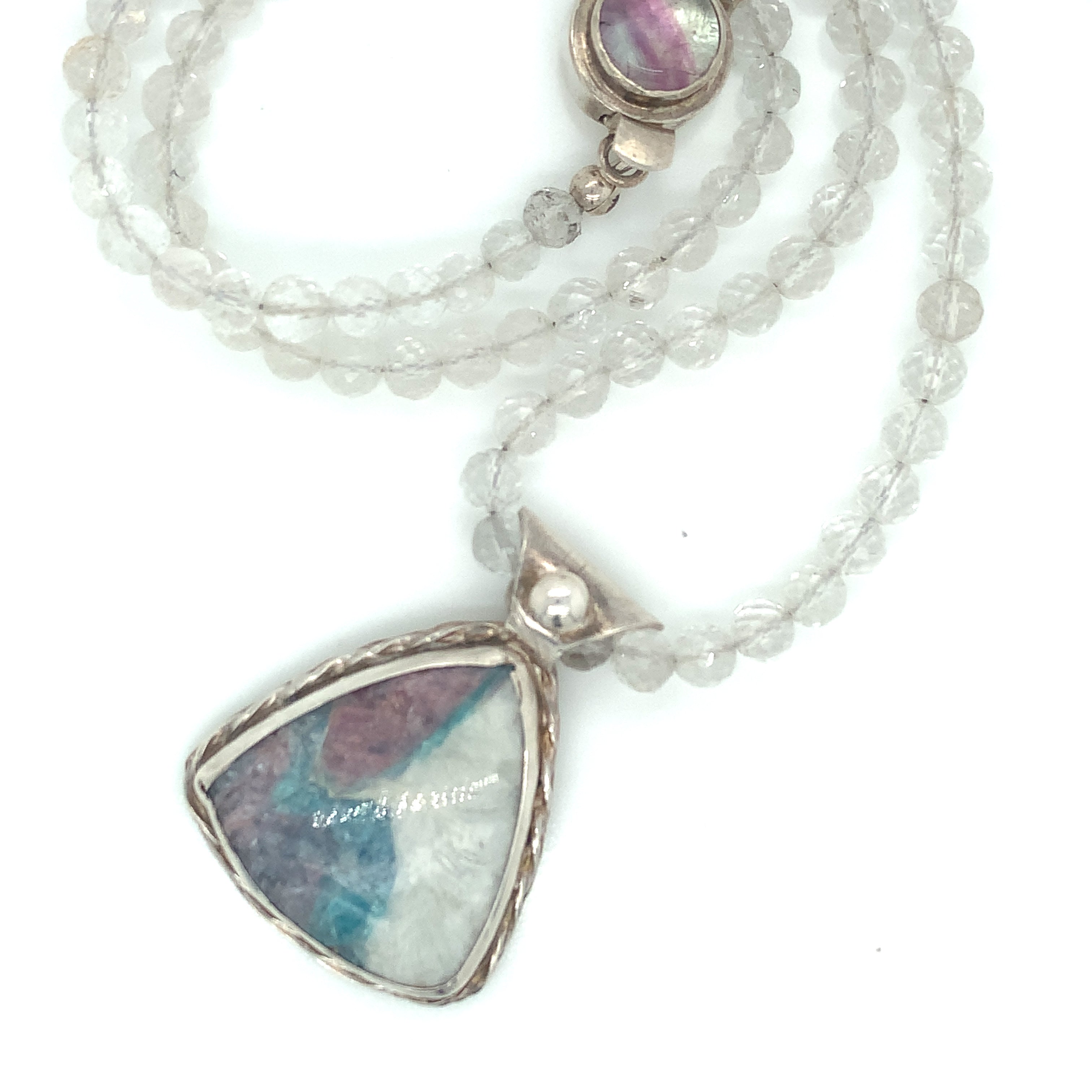 Parabia Tourmaline pendant necklace featuring white topaz and sterling setting