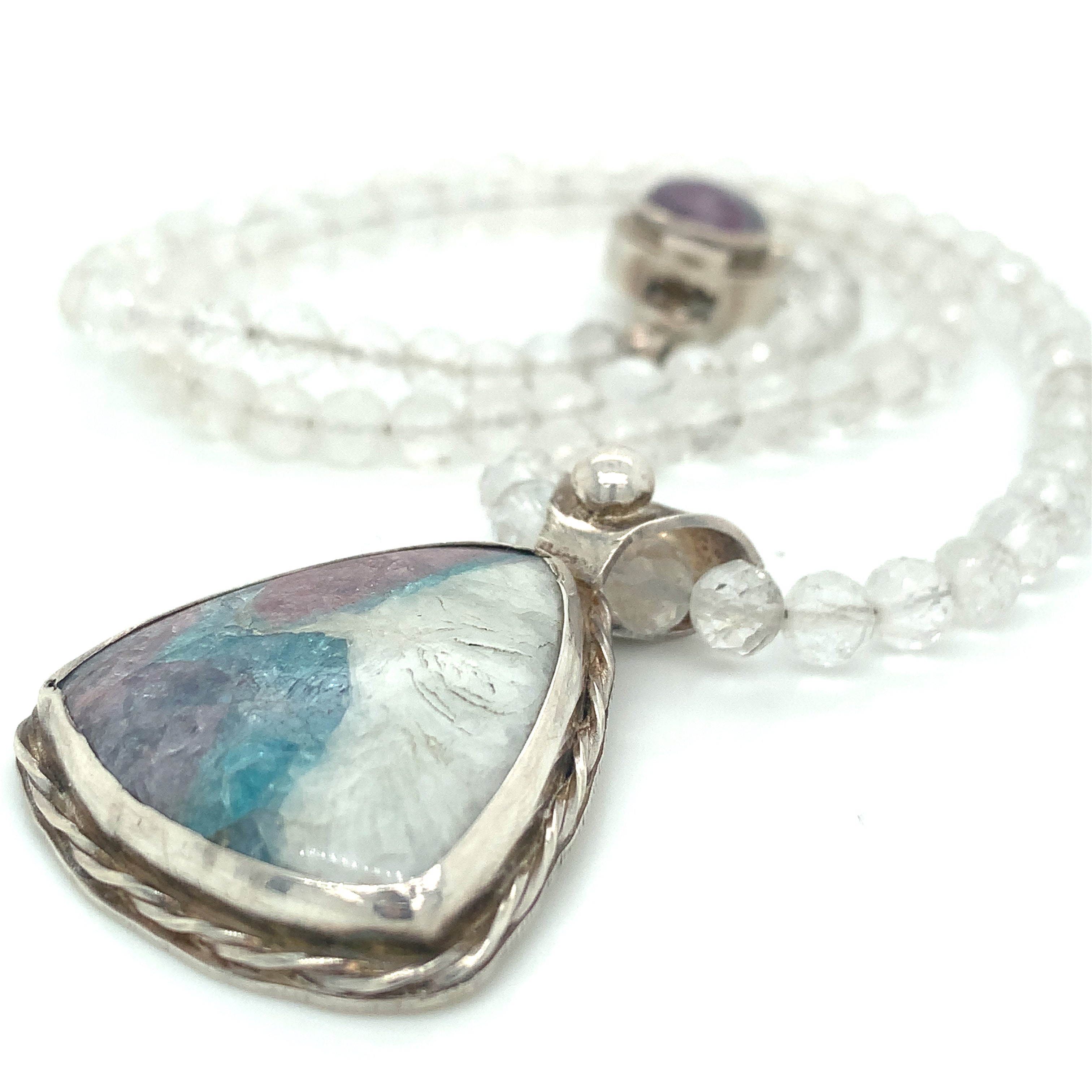Parabia Tourmaline pendant necklace featuring white topaz and sterling setting