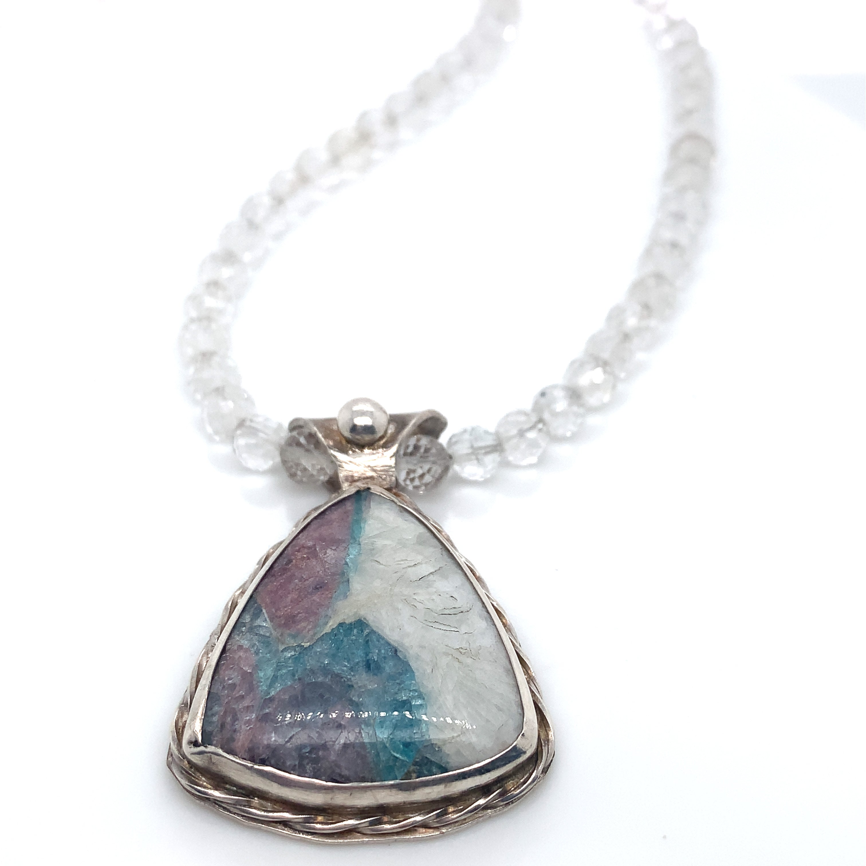 Parabia Tourmaline pendant necklace featuring white topaz and sterling setting
