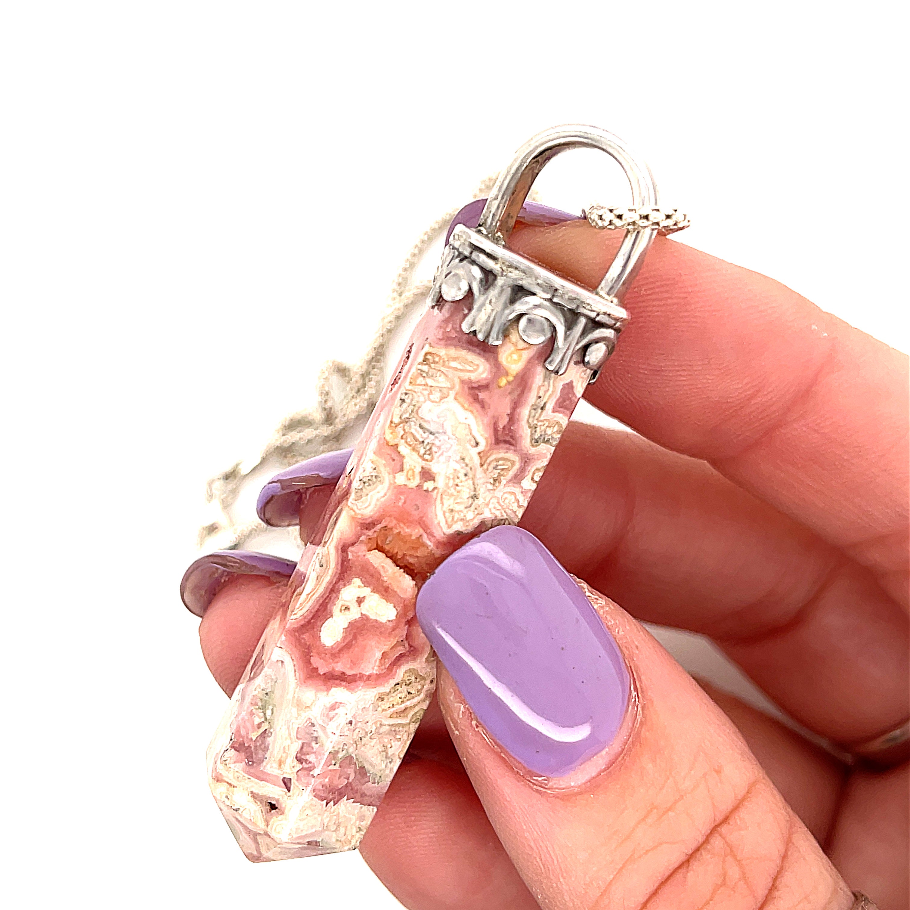 Rhodochrosite gemstone pendant on sterling silver chain necklace