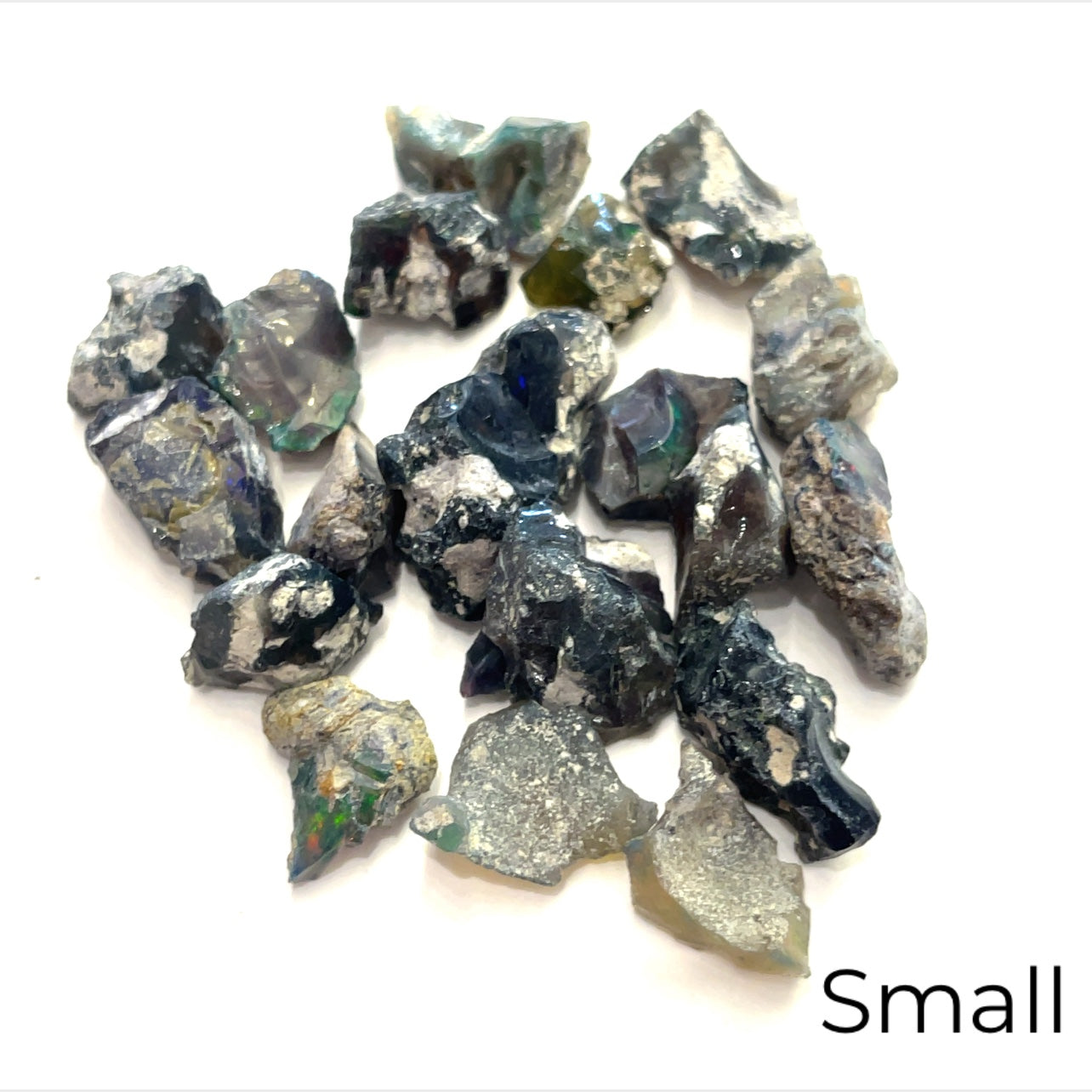 A collection of raw Ethiopian opal gemstones with varying colors, displayed on a white background. small 