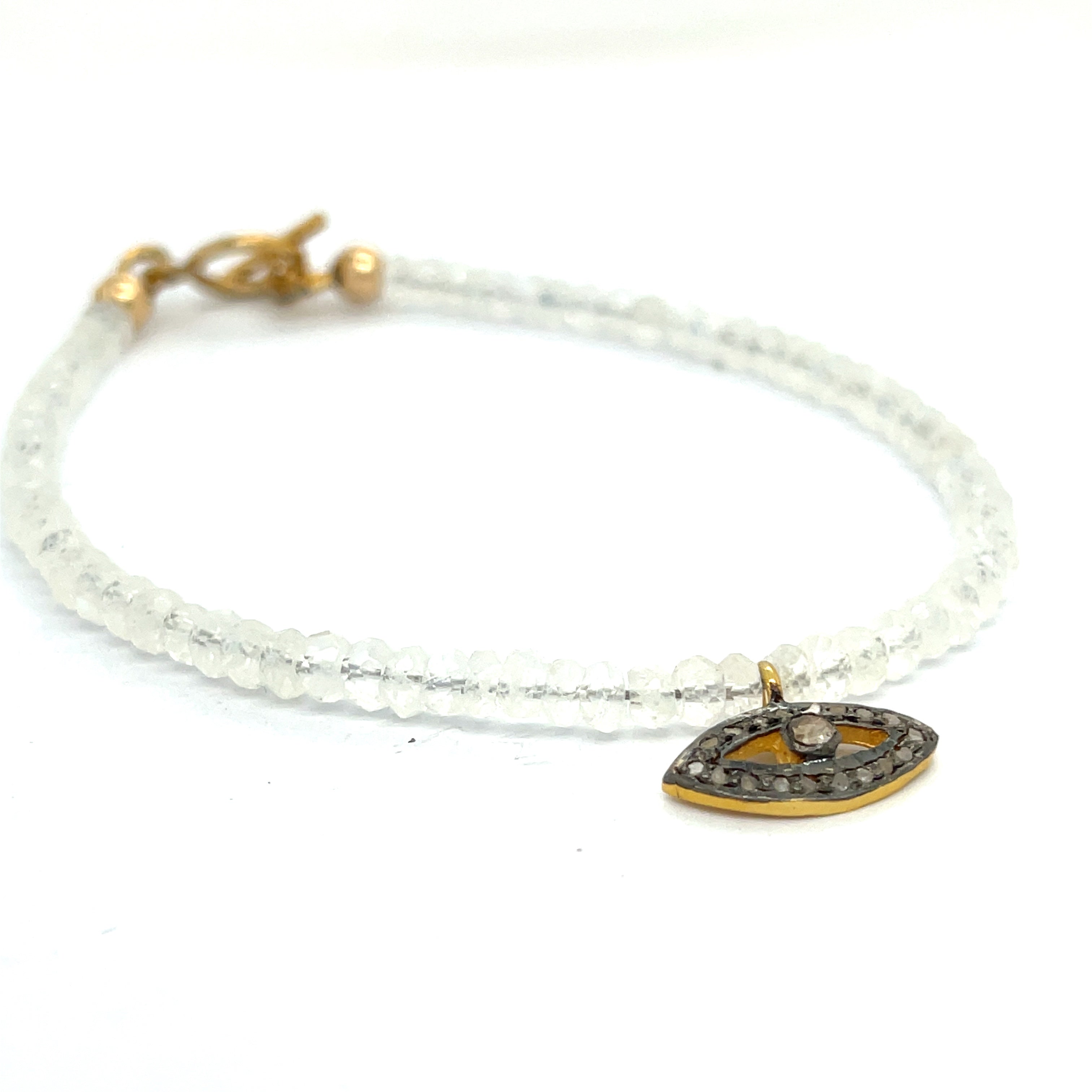 Rainbow Moonstone with a gold filled paved diamond evil eye charm beaded bracelet