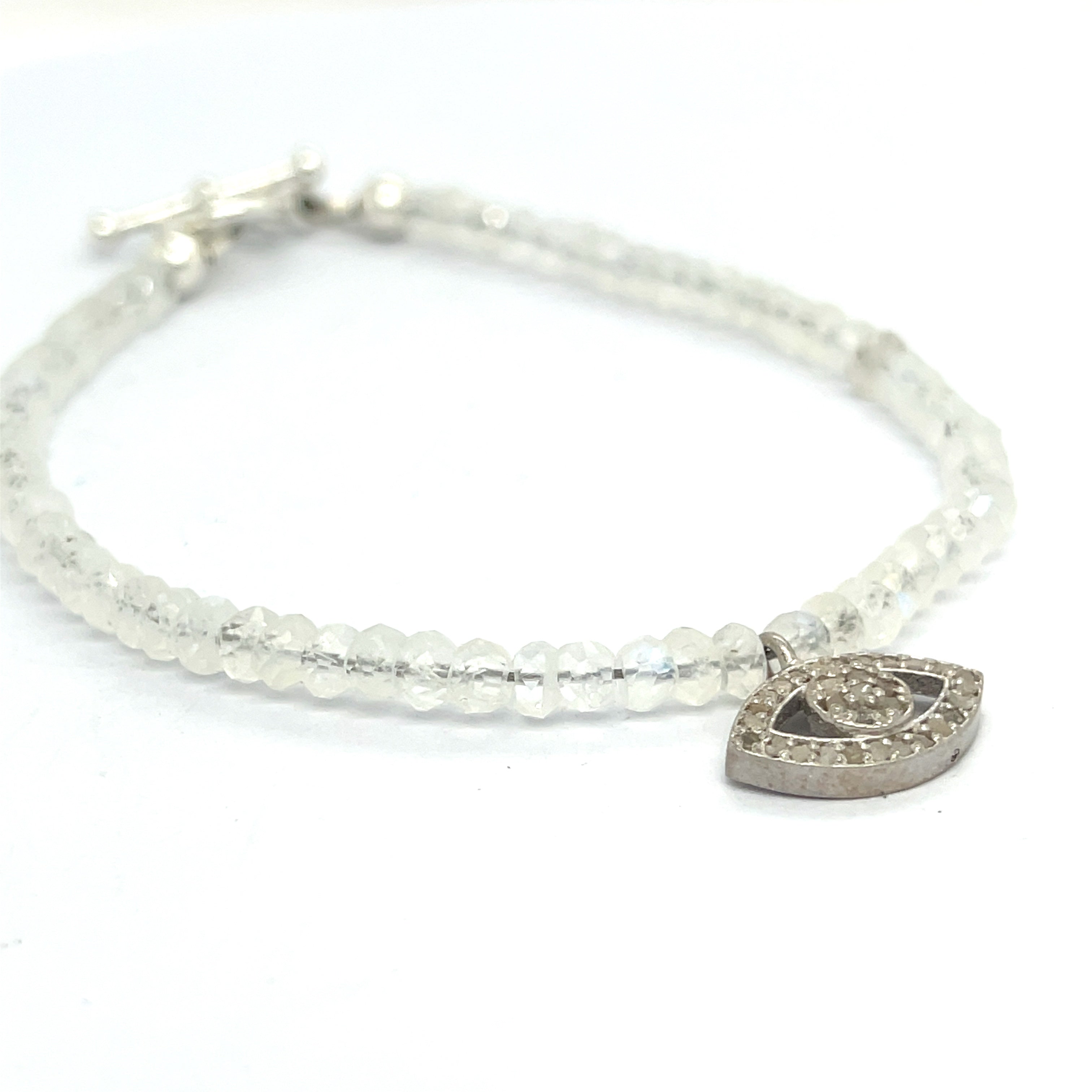 Rainbow Moonstone with a gold filled paved diamond evil eye charm beaded bracelet
