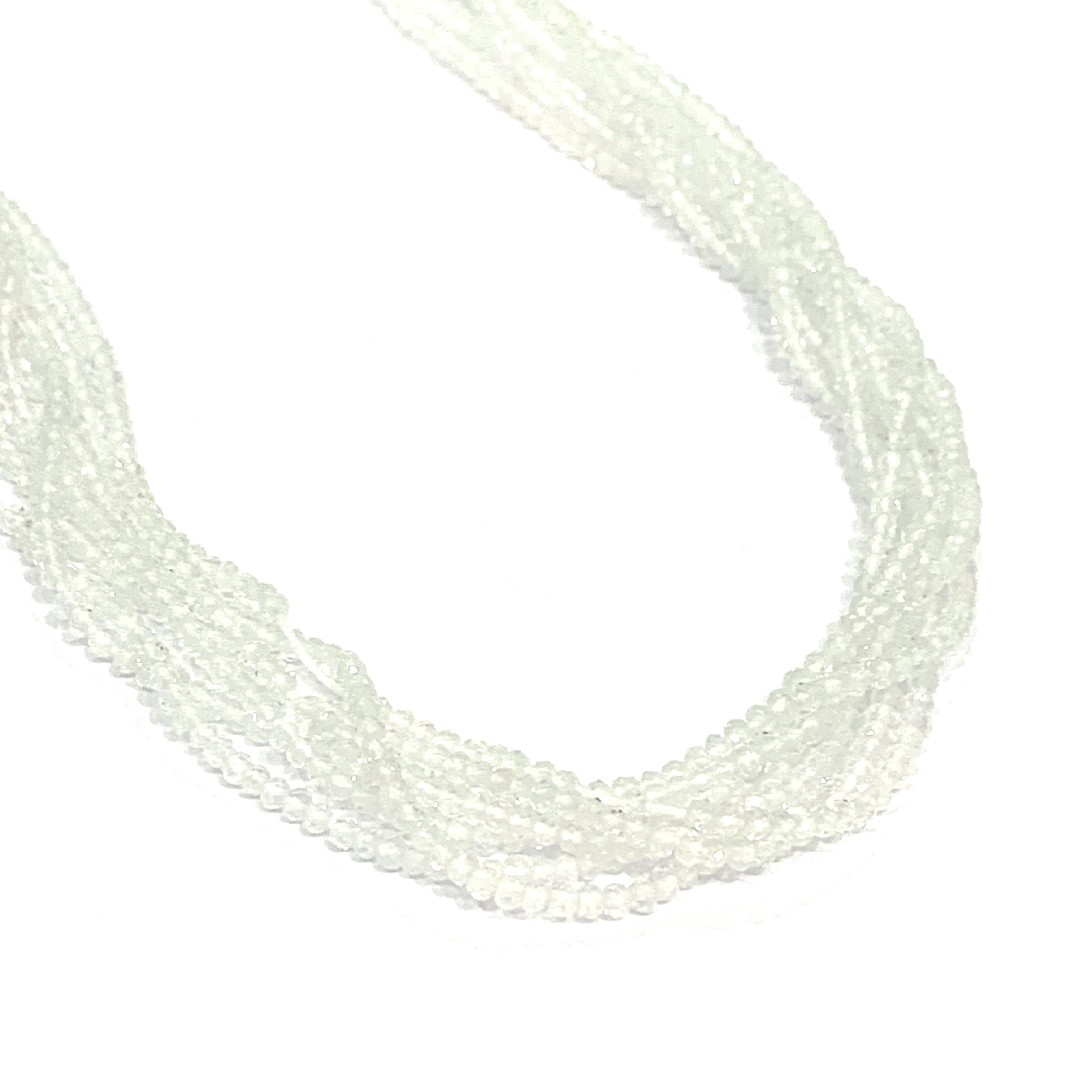 2mm Clear Topaz faceted round gemstone strand, on a white background, front overview. 