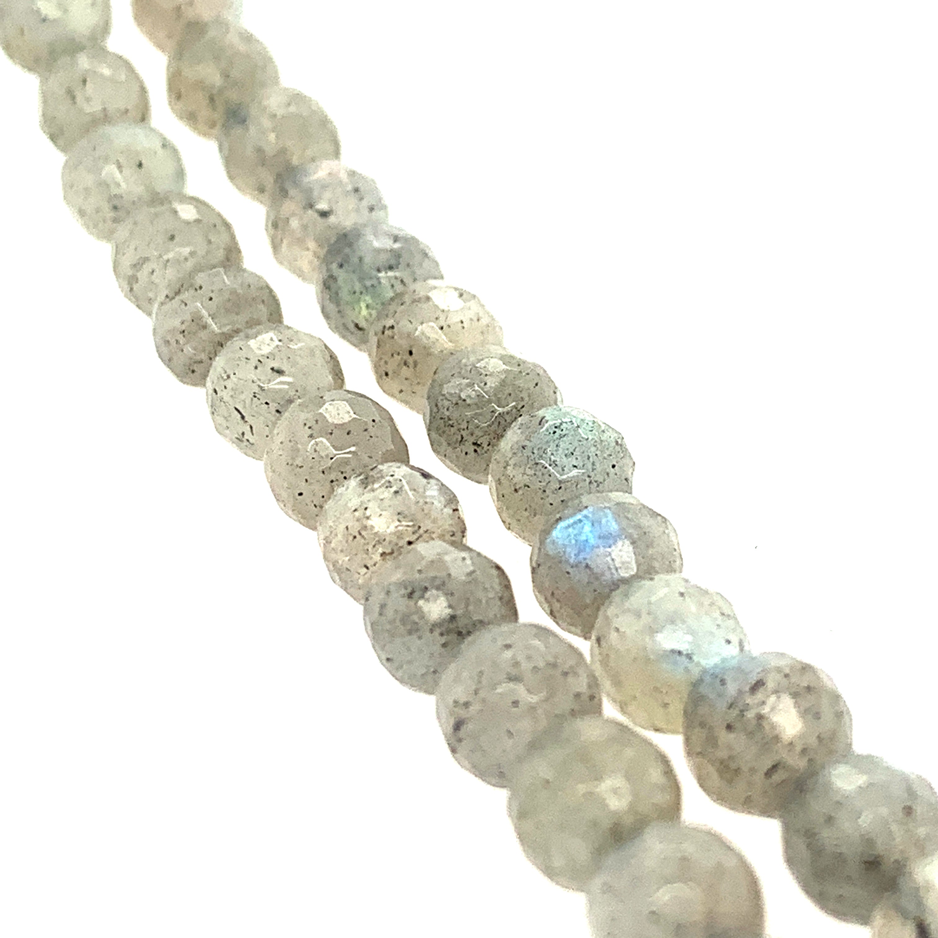 3mm faceted round  Labradorite beads on a white background, front overview.
