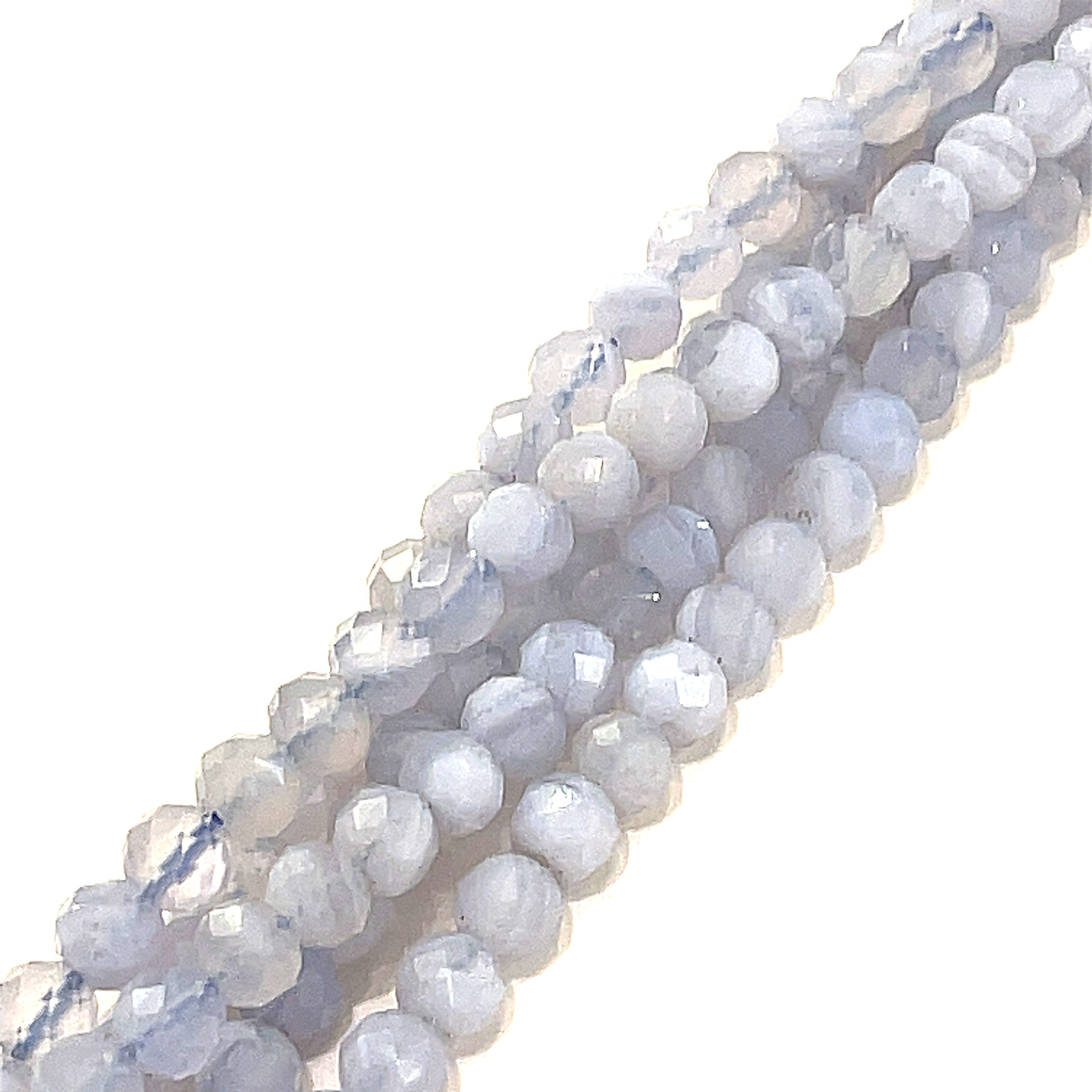 4mm Blue lace Agate faceted round gemstones on a white background, front overview. 