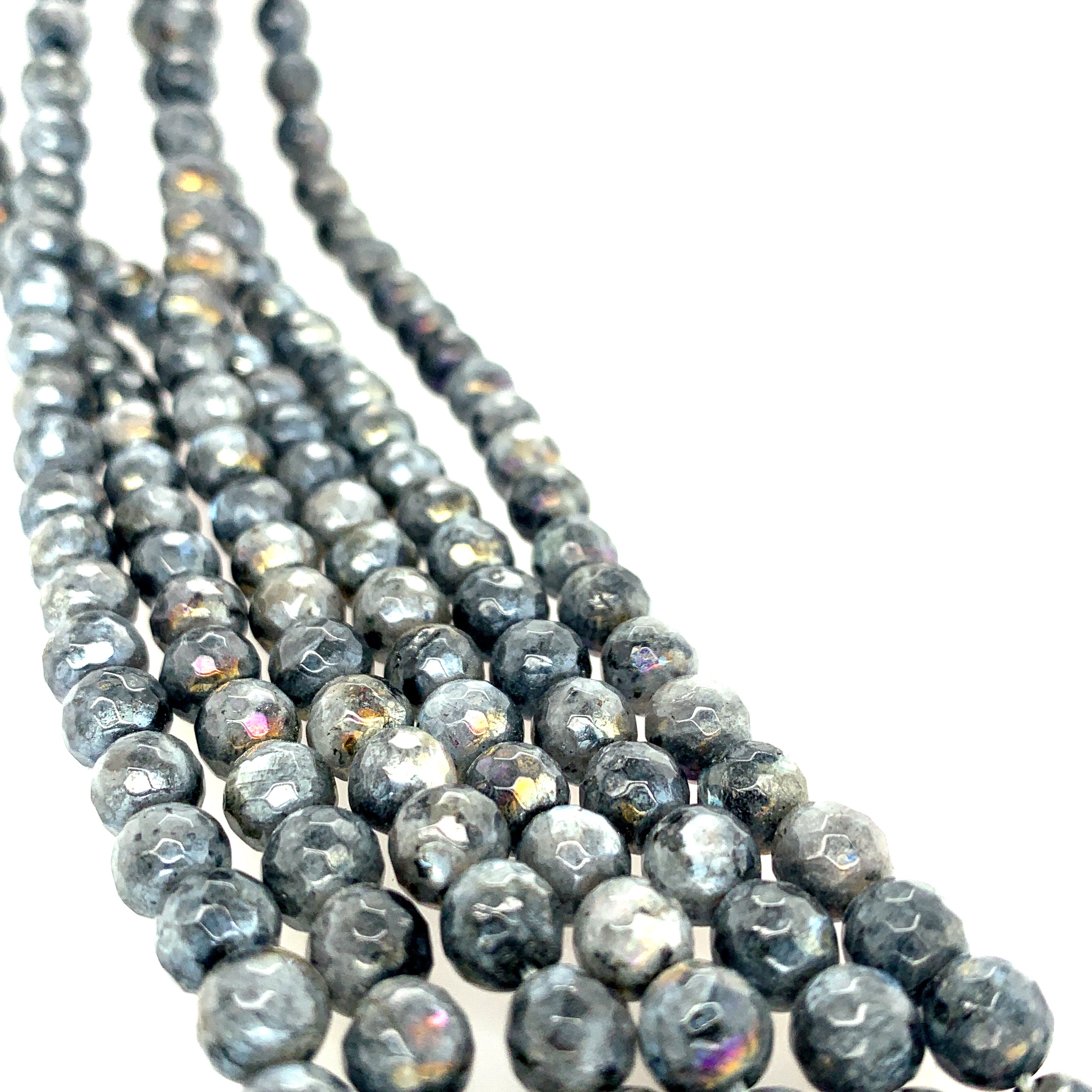 4mm faceted round Black Labradorite beads on a white background, front overview