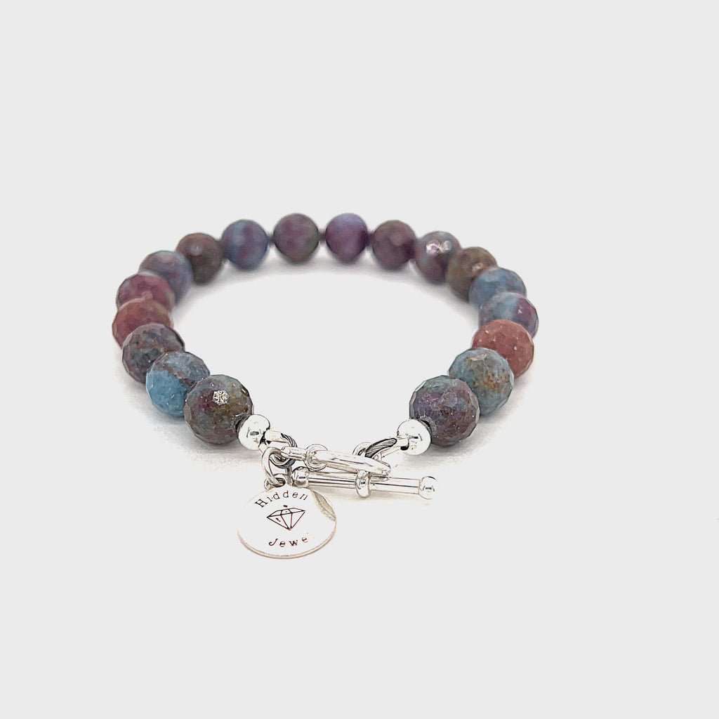 Ruby Kyanite gemstone bracelet with sterling silver toggle clasp on white background front and center overview. video