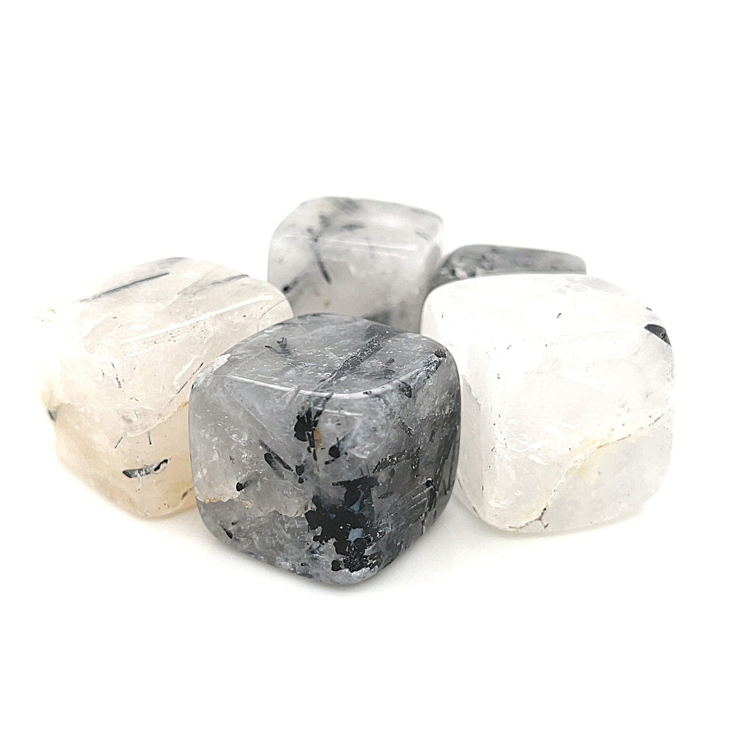 A collection of Tourmalinated Quartz tumbled gemstones displayed on a white background, front overview. video