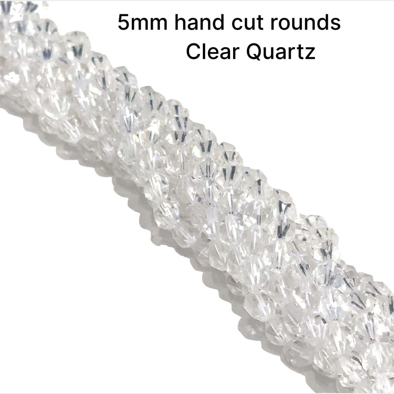 5mm Clear Quartz gemstone hand cut rounds strand on a white background, overview. 