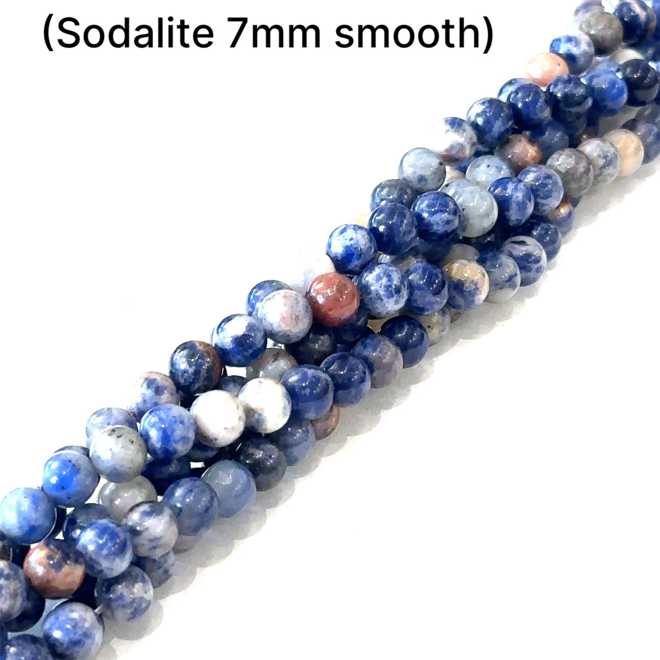 7mm Sodalite smooth round gemstone strand on a white background, front close up  overview.