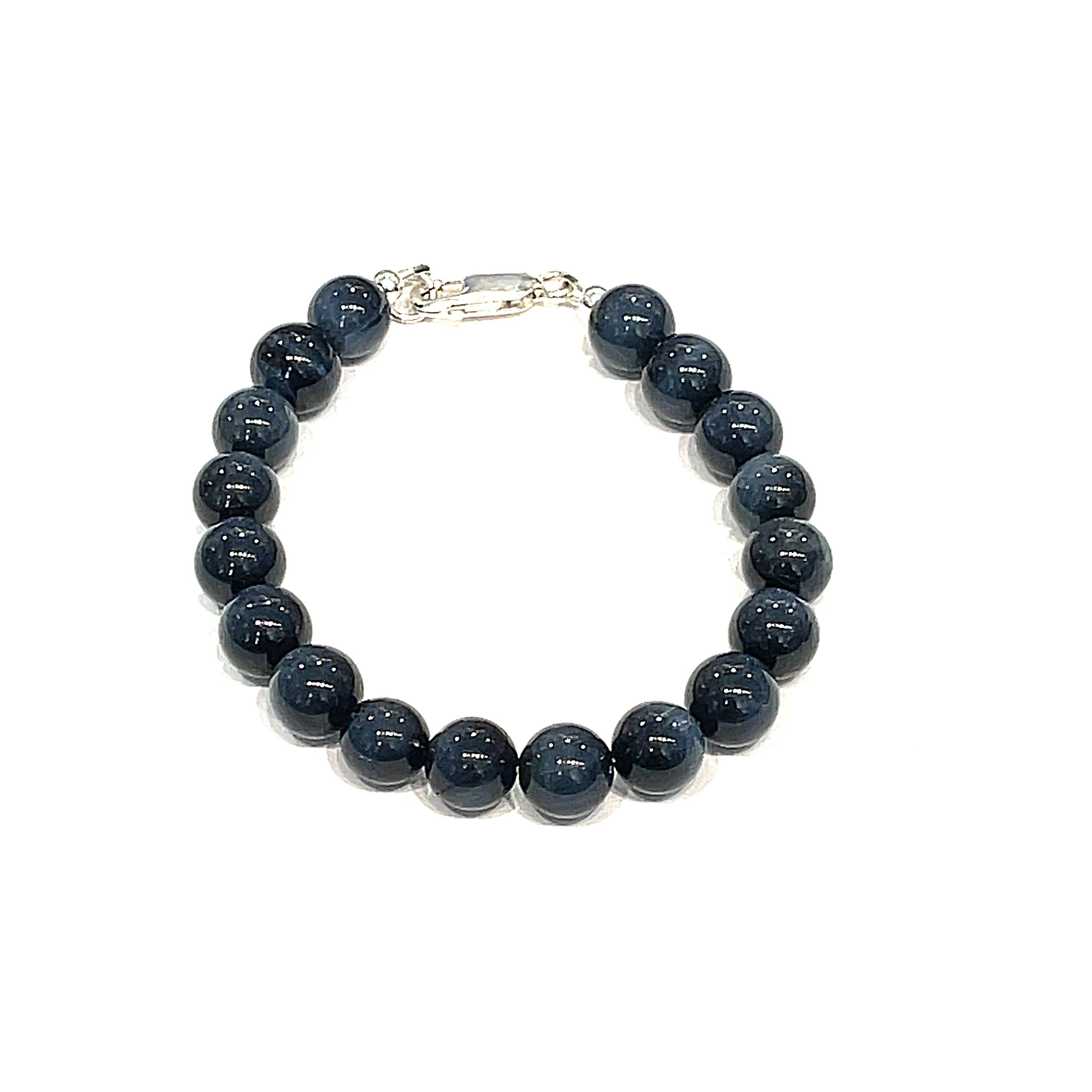 8.5mm Blue Tiger Eye gemstone beaded bracelet with sterling silver lobster claw clasp showing deep midnight blue chatoyant bands on a white background, front view. 