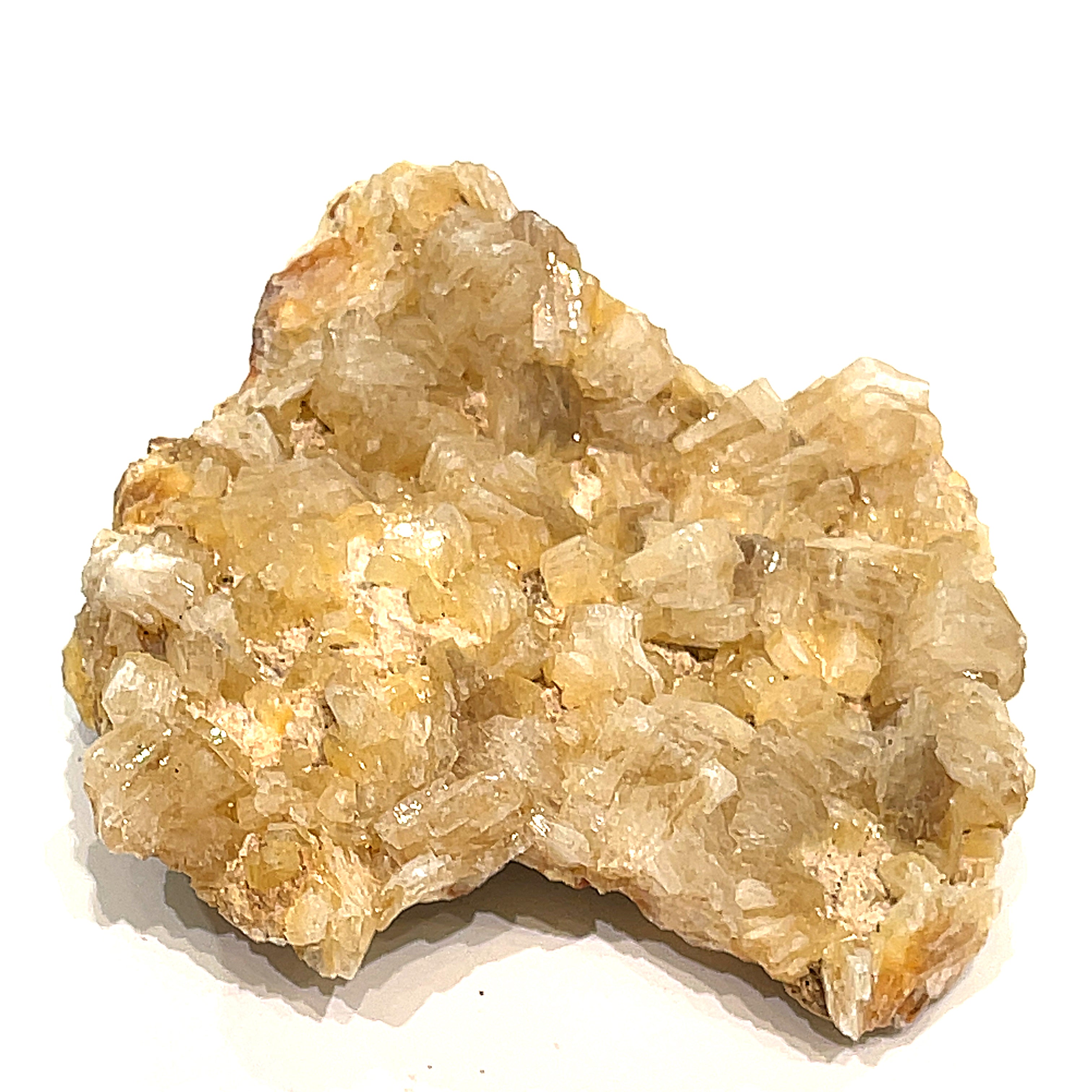#8 Peach Stilbite on a white background, front view. 