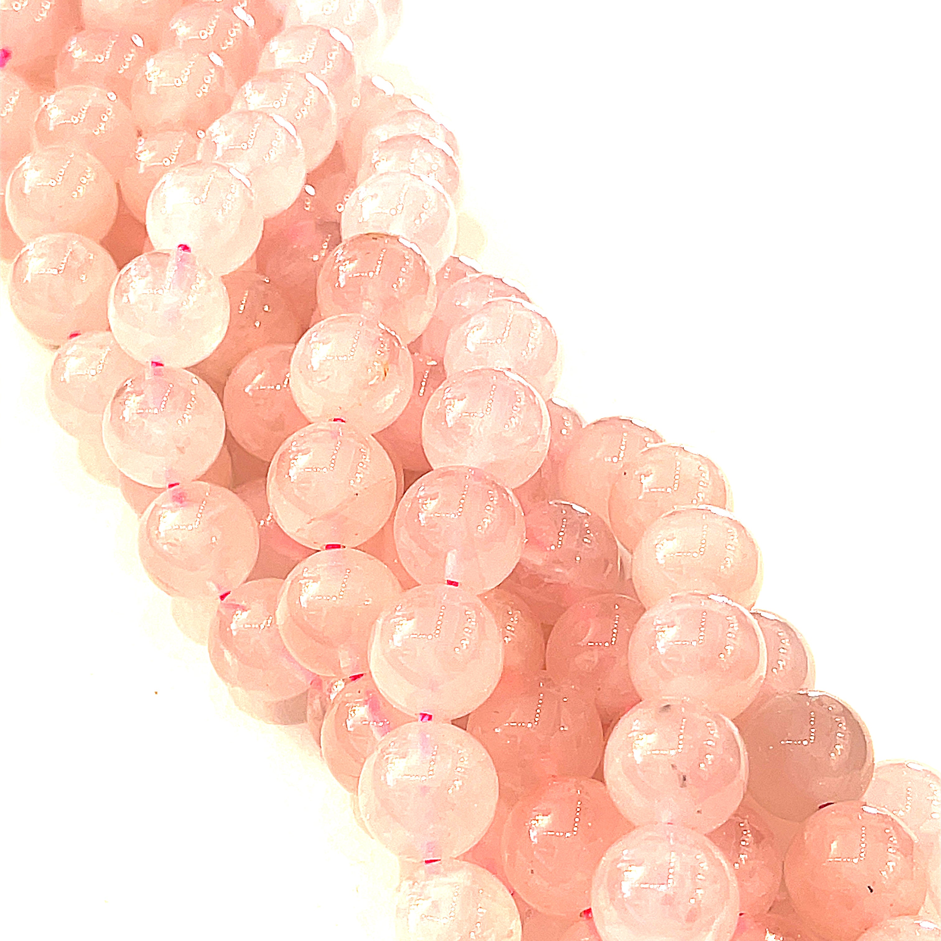 8mm  Rose Quartz gemstone beads, smooth round, 16'' strand on a white background, front overview.
