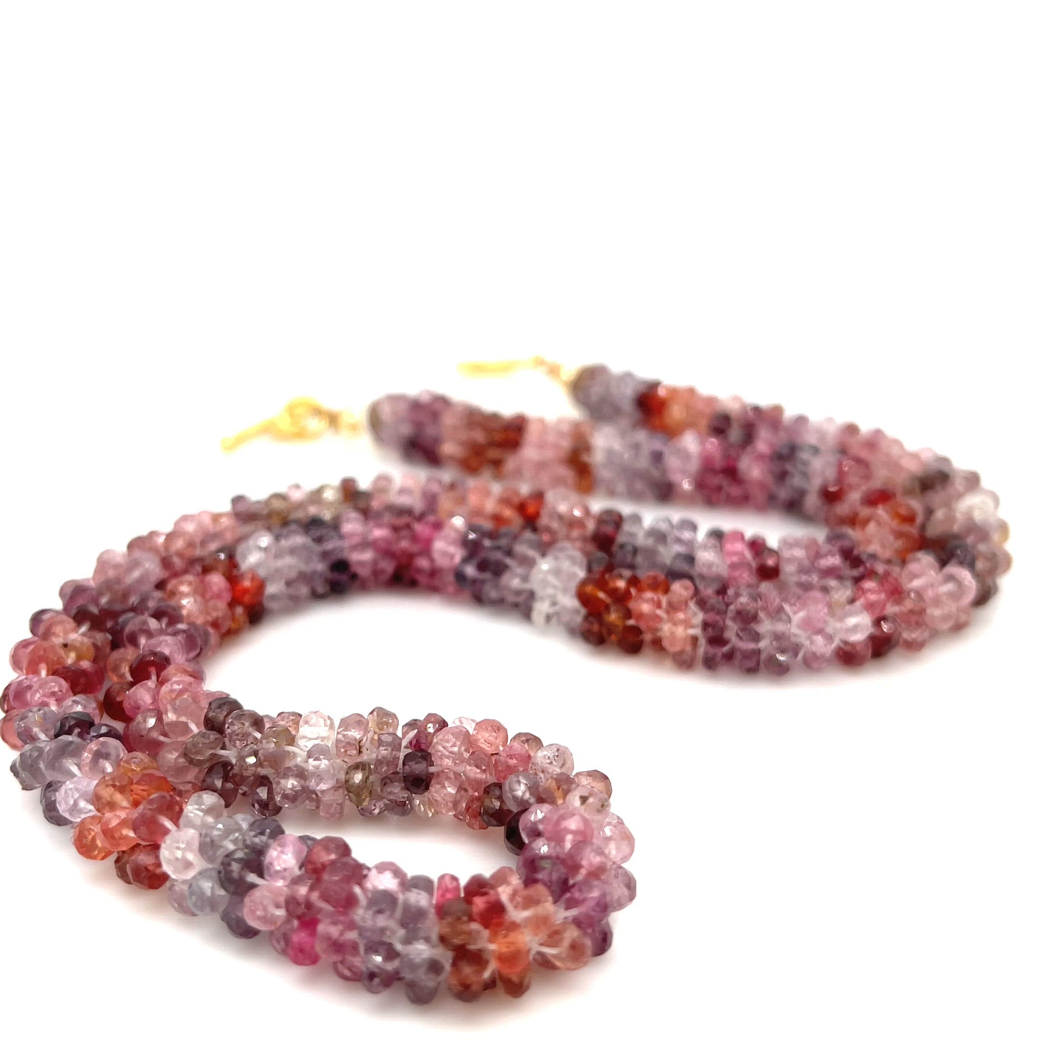 Handcrafted Red Spinel gemstone necklace — passion and vitality crystal jewelry on white background front overview video.