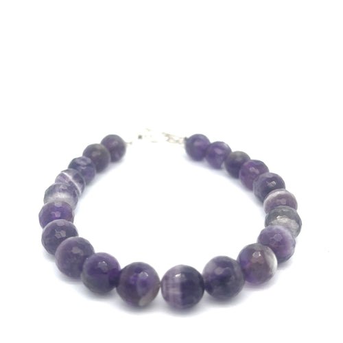 A Close-up view of polished Amegreen gemstone beads in soft lavender and green tones, handcrafted healing bracelet front overview.