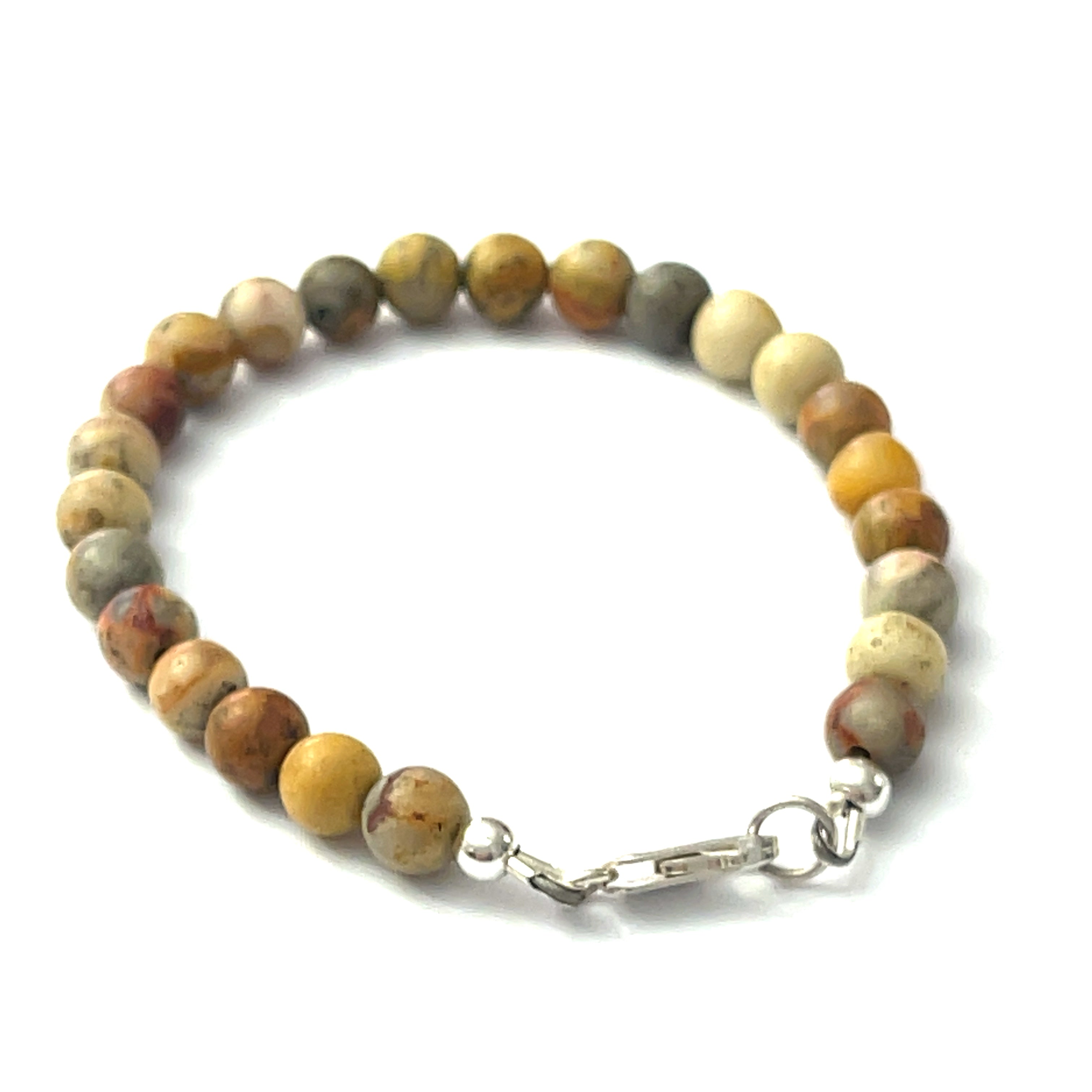 A Crazy Lace Agate gemstone beaded bracelet with sterling silver lobster claw on a white background back right angle overview. 