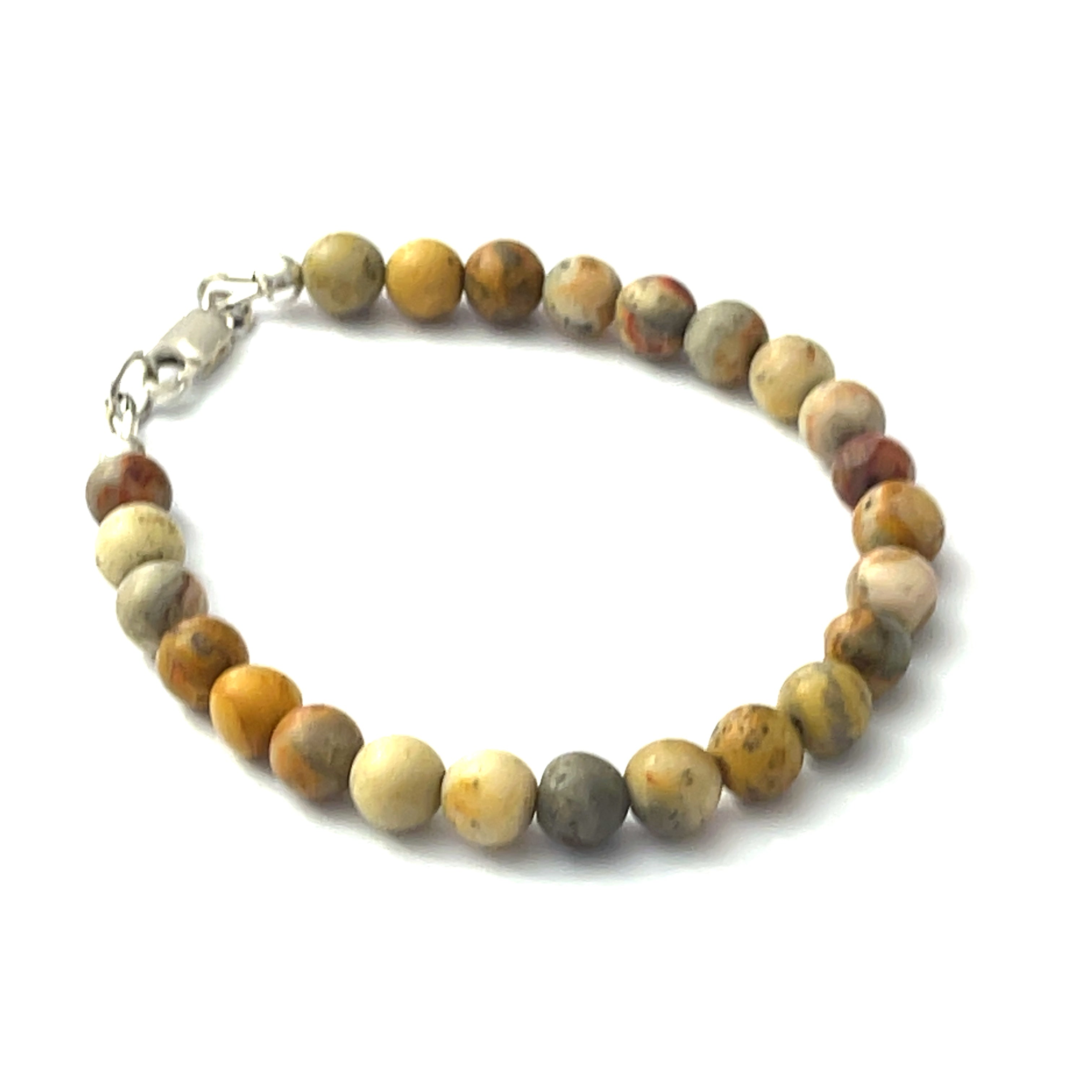 A Crazy Lace Agate gemstone beaded bracelet with sterling silver lobster claw on a white background front right angle overview. 