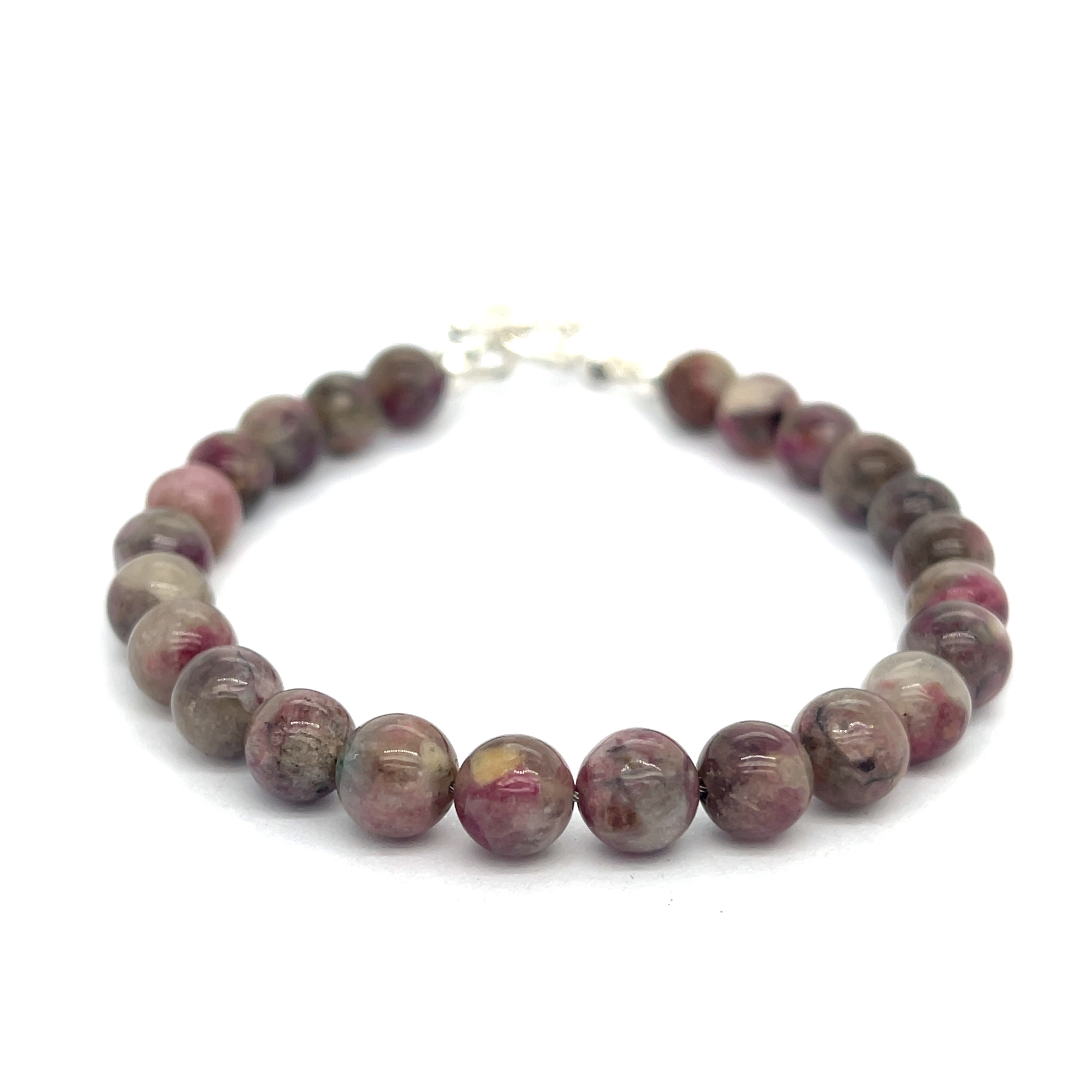 A Eudialyte gemstone beaded bracelet with a sterling silver toggle on a white background front overview.