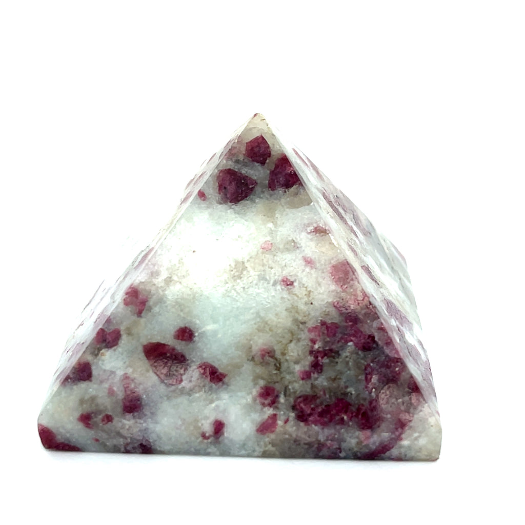 A Pink Tourmaline Pyramid used for heart chakra meditation and energy healing on a white background a front view.