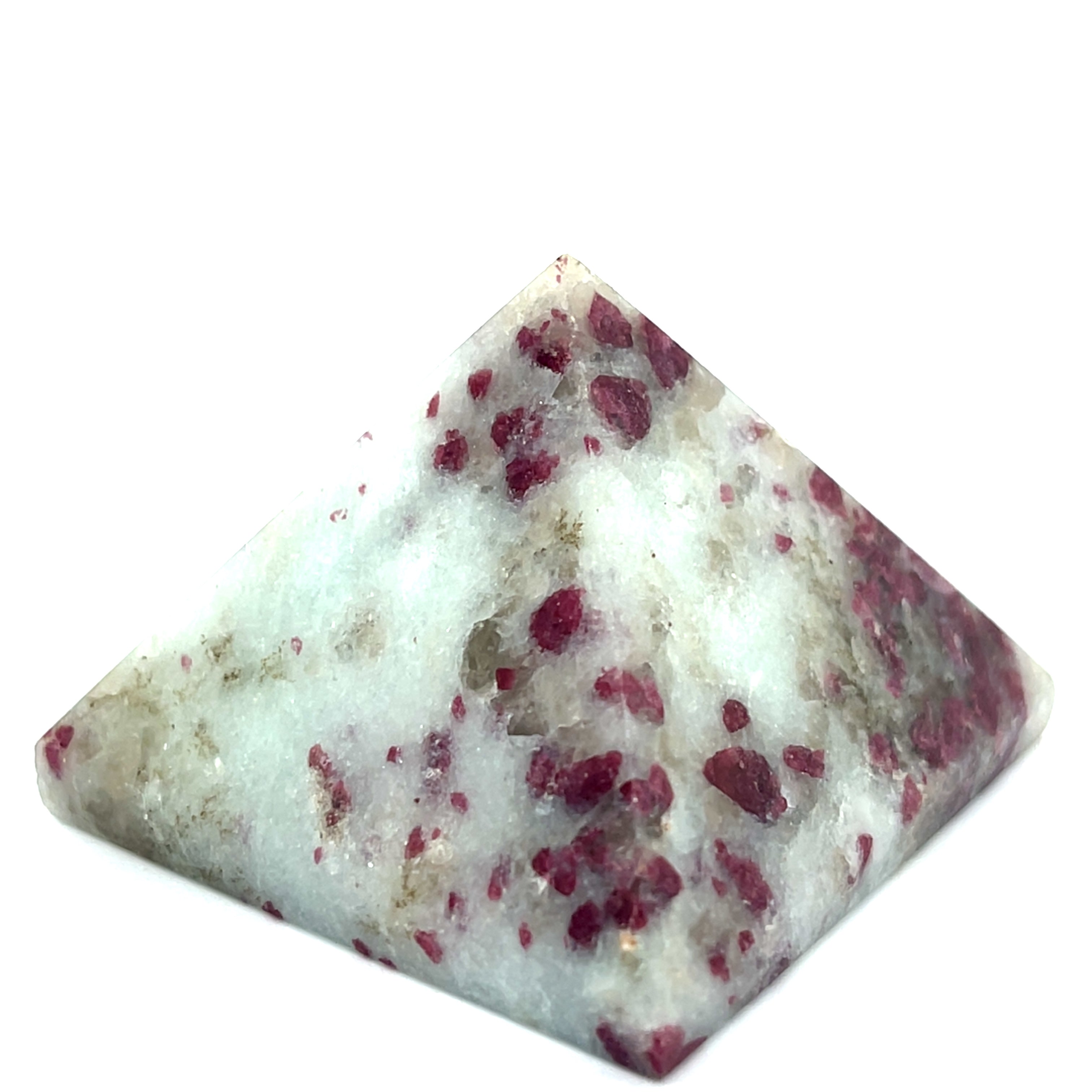 A Pink Tourmaline Pyramid used for heart chakra meditation and energy healing on a white background overview. 