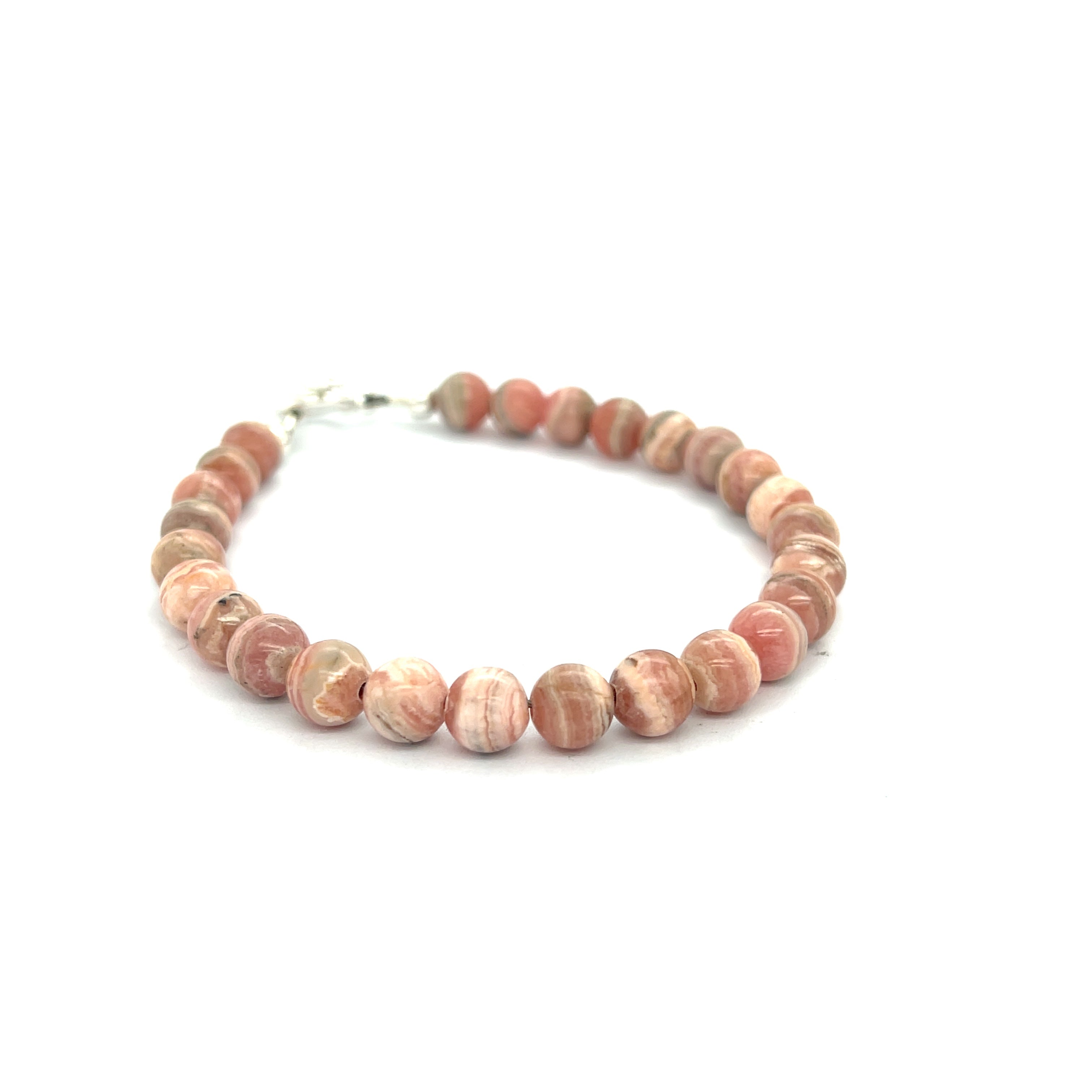 A Rhodochrosite Gemstone 6mm roundel beaded bracelet with a sterling silver toggle, on a white background, front overview. 