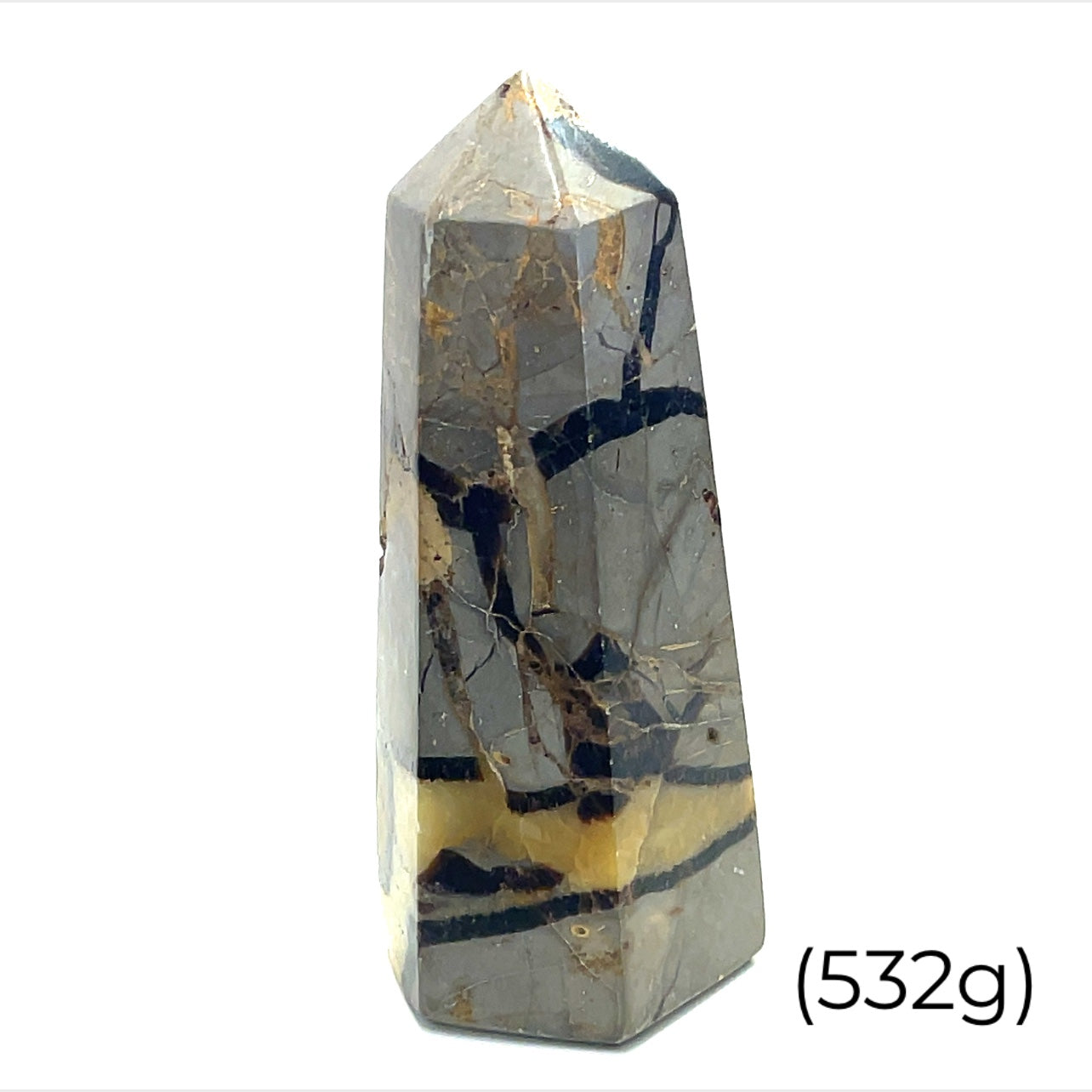 A  Septarian Nodule gemstone towers arranged in a line, displaying a variety of earthy colors and patterns on a white background, weighing (532g), front view