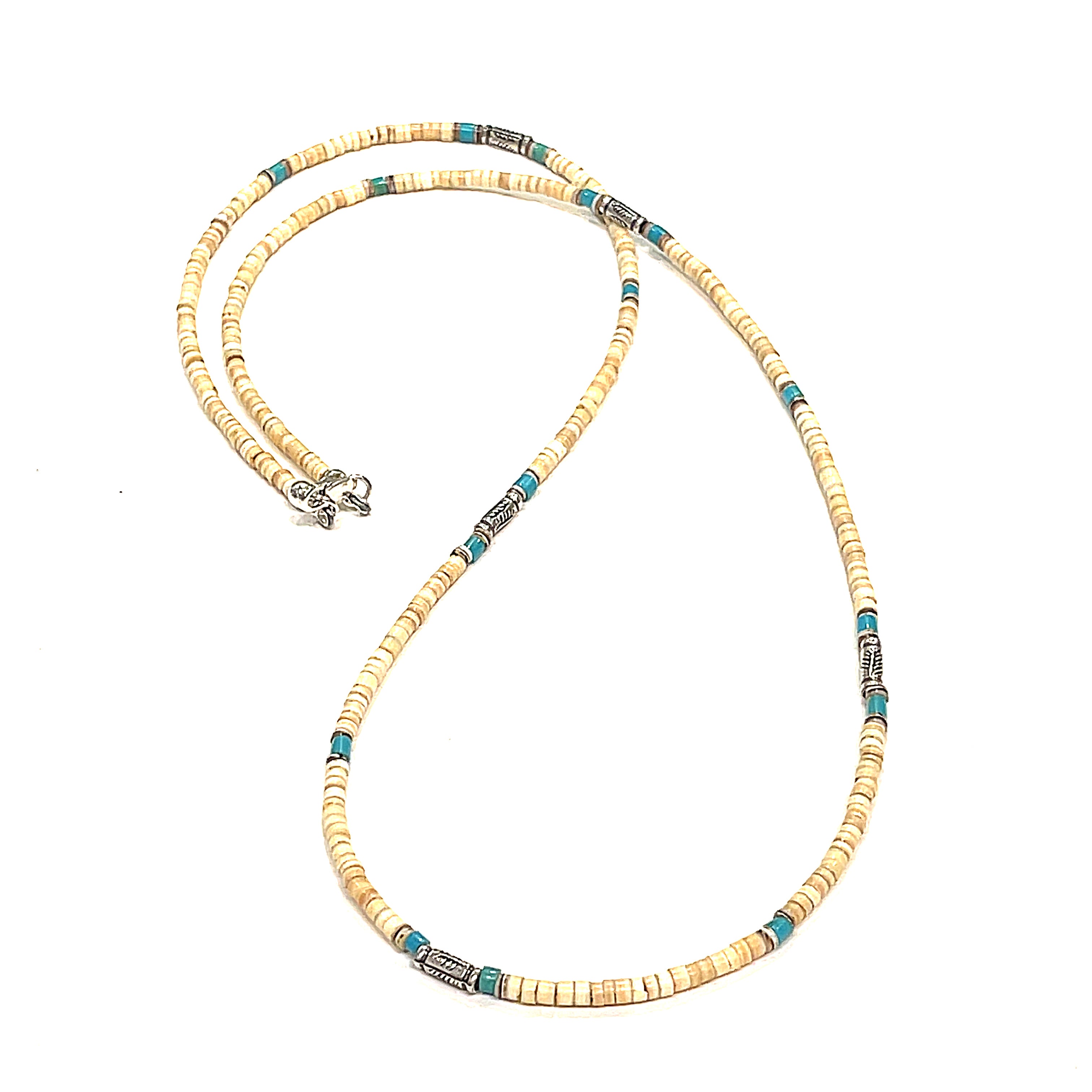 A Shell roundel gemstone necklace with sterling silver tribal tube beads on a white background, front long overview.