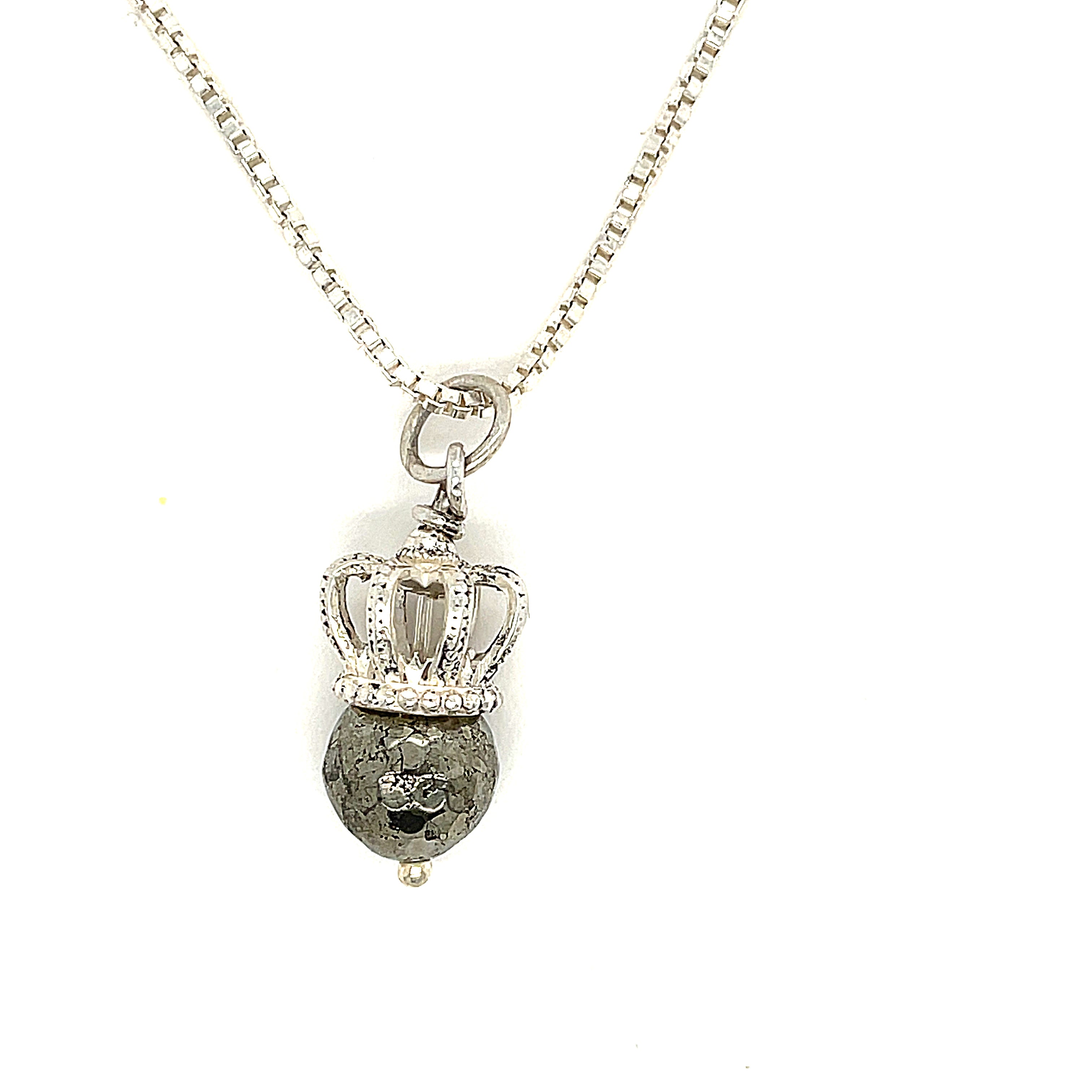 A Sterling Silver Crown Pendant with pyrite gemstone on a white background, front overview. 