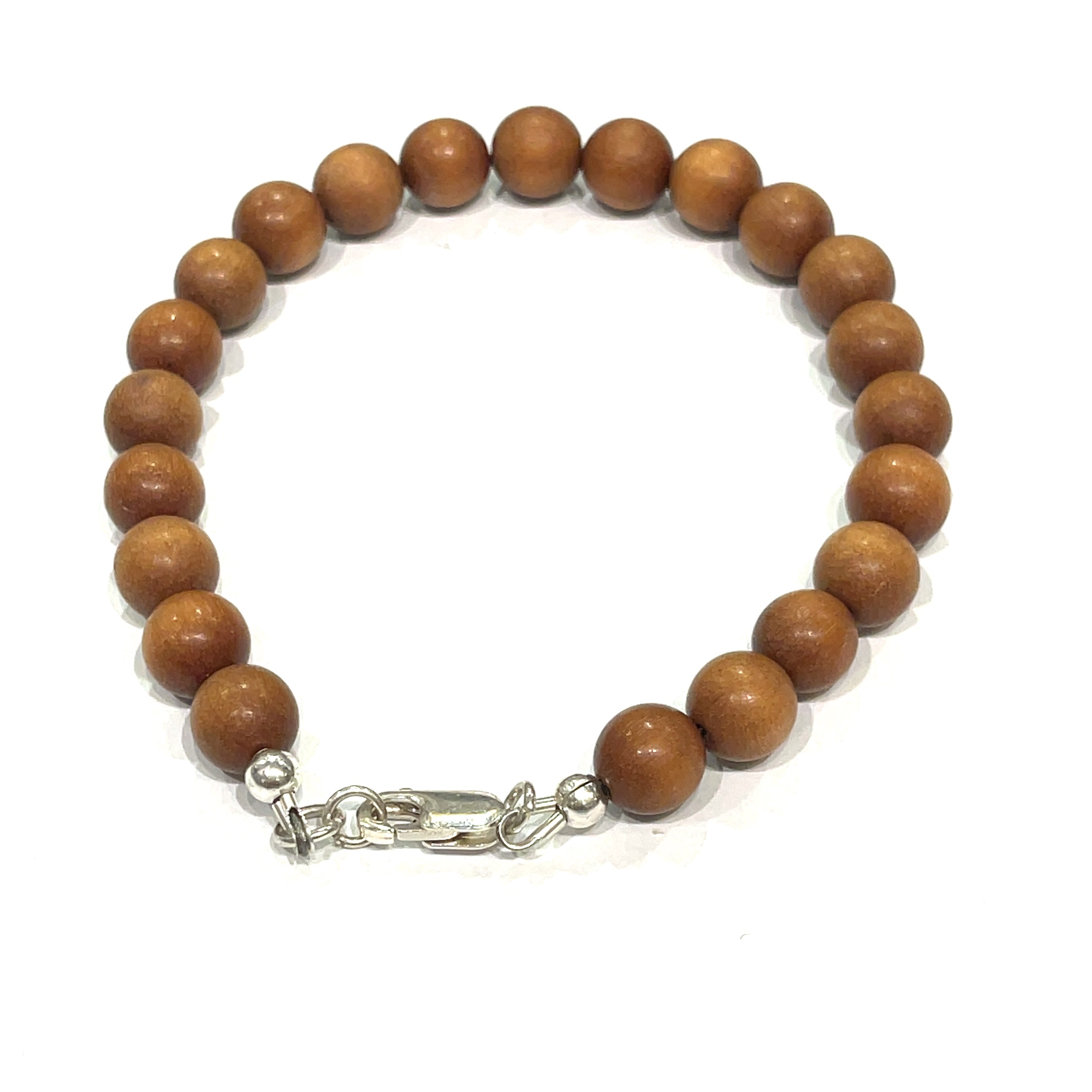 A brown sandalwood beaded bracelet with a sterling silver lobster-claw clasp on a white background, back overview.
