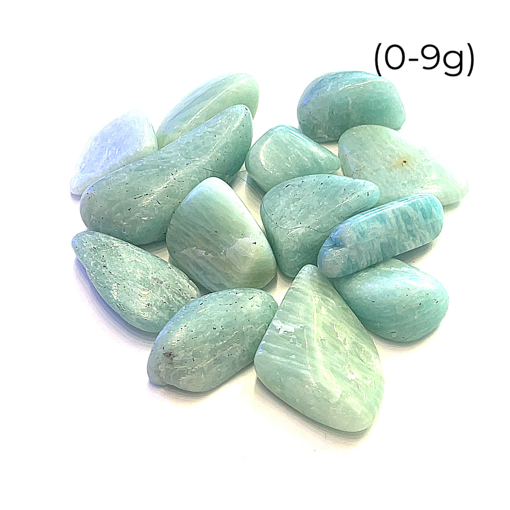 A collection of Amazonite gemstone tumbles (0-9g), front close up overview.  