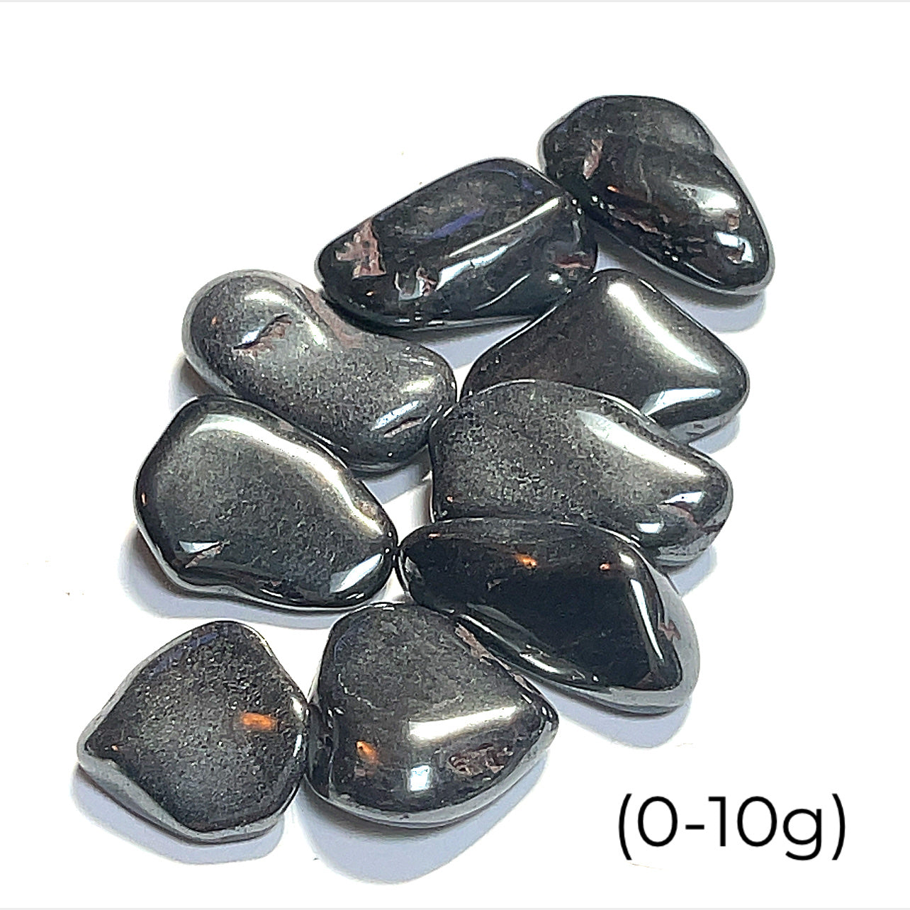 A collection of Hematite gemstones (0-10g) on a white background, front view. 