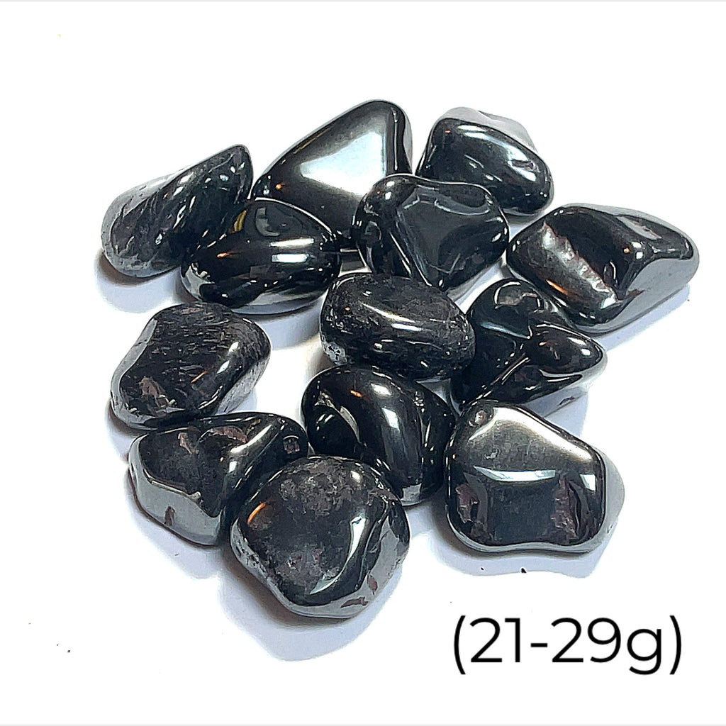 A collection of Hematite gemstones (21-20g) on a white background, front view. 