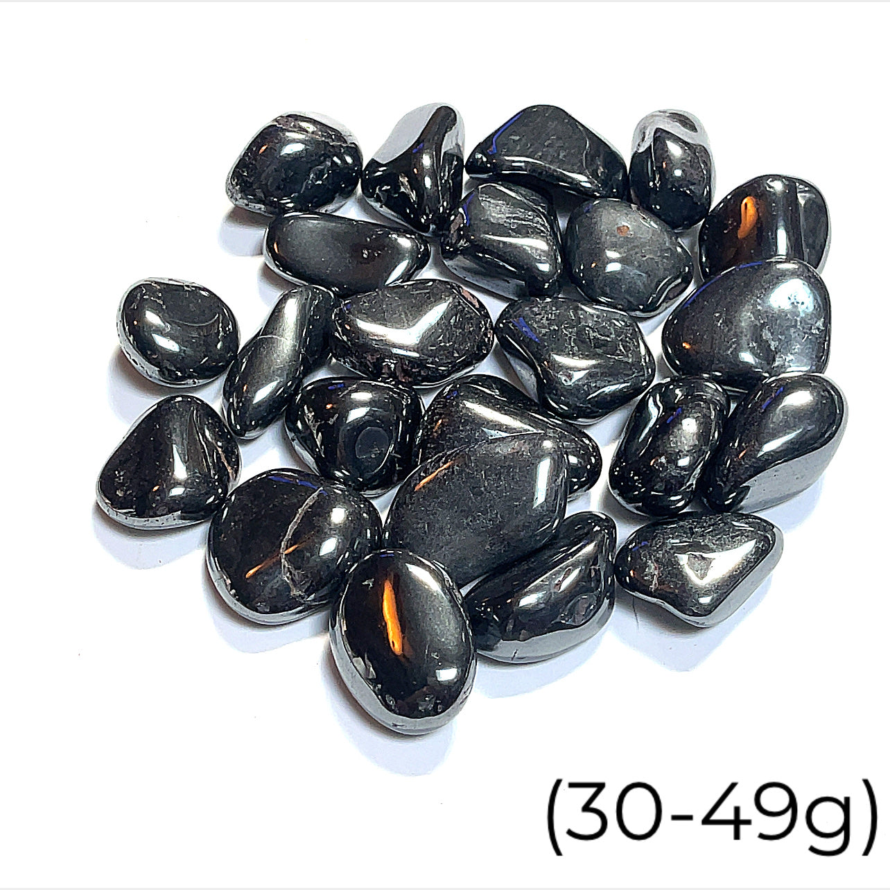 A collection of Hematite gemstones (30-49g) on a white background, front view. 