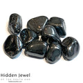 A collection of Hematite gemstones on a white background, front view. 