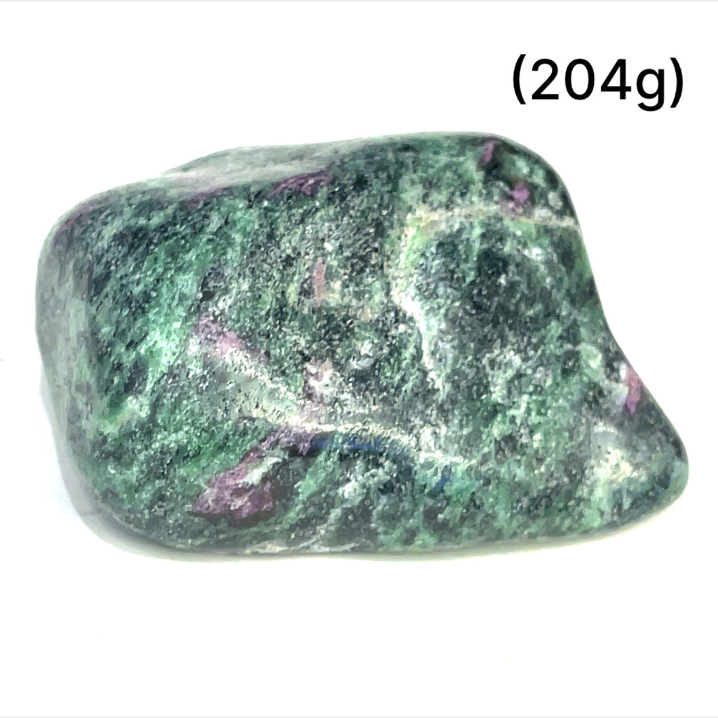 A collection of Ruby in Zoisite tumbled gemstones varying in shades of green with hints of purple, displayed on a white surface. The size of the stones is indicated as 204 grams.