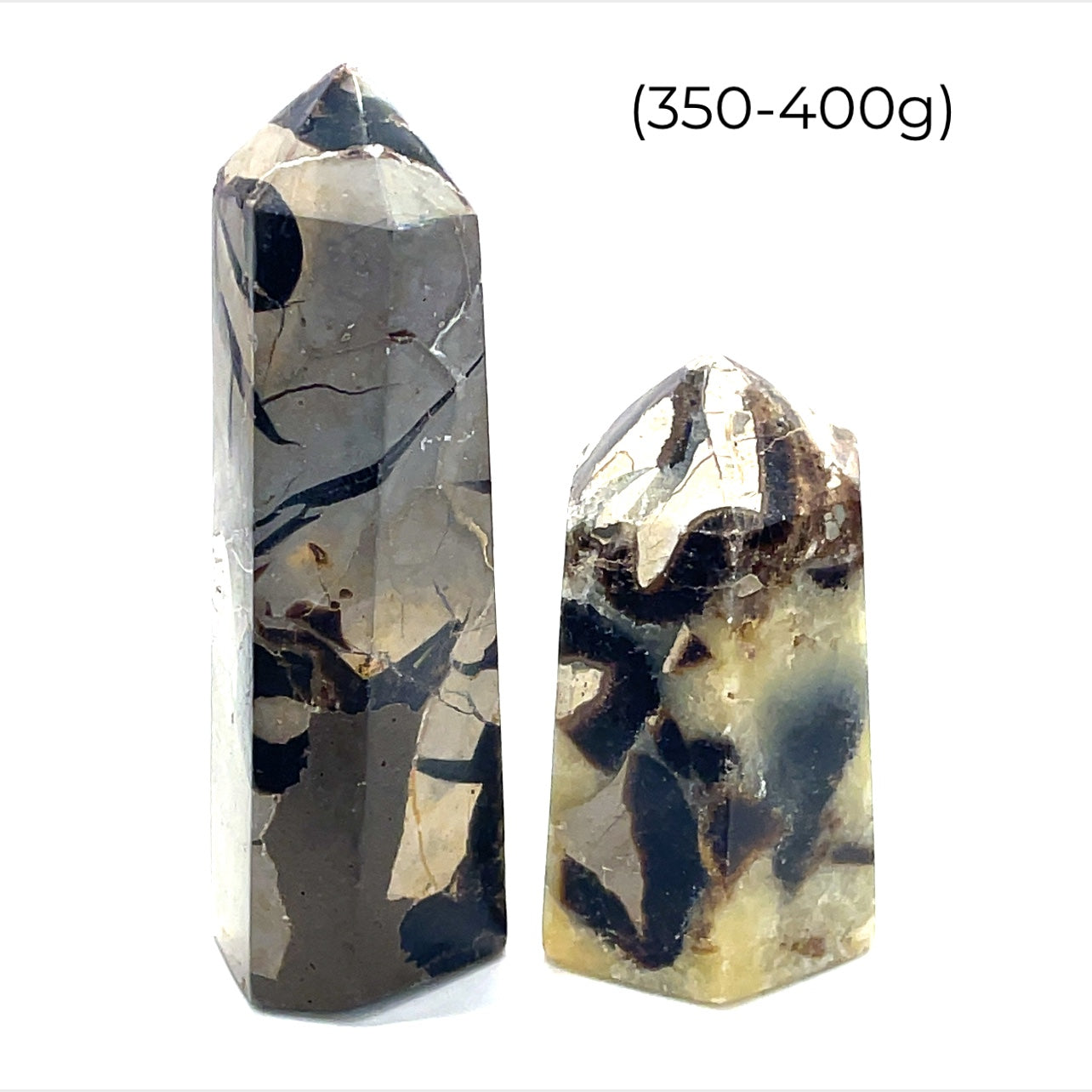 A collection of Septarian Nodule gemstone towers arranged in a line, displaying a variety of earthy colors and patterns on a white background, weighing (350-400g), front view. 