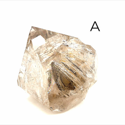 A collection of raw Herkimer diamond gemstones (A) displayed on a white background, close up,  overview. 