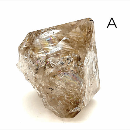 A collection of raw Herkimer diamond gemstones (A) displayed on a white background, right side,  overview. 