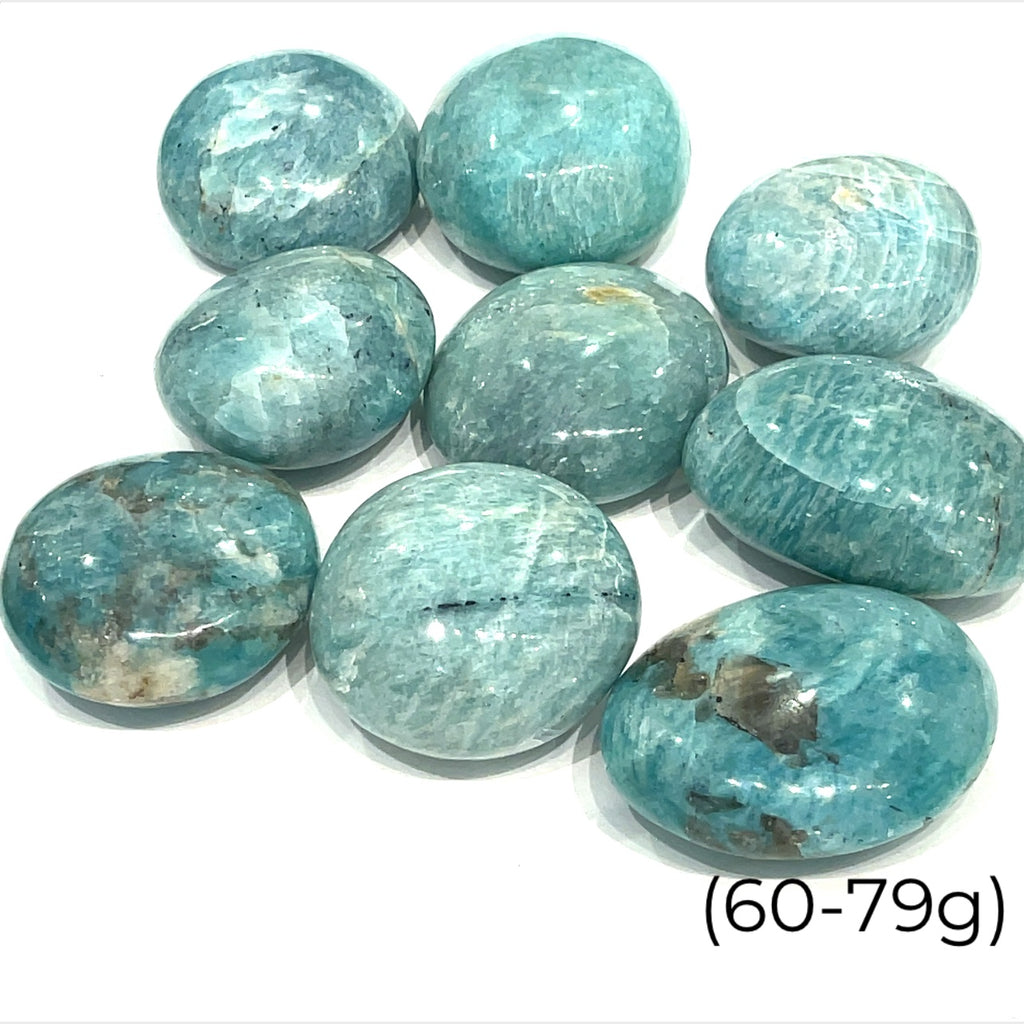 A collection of round Amazonite palm stones with a smooth, polished surface showcasing various shades of blue and green, on a white background. size (60-79g)