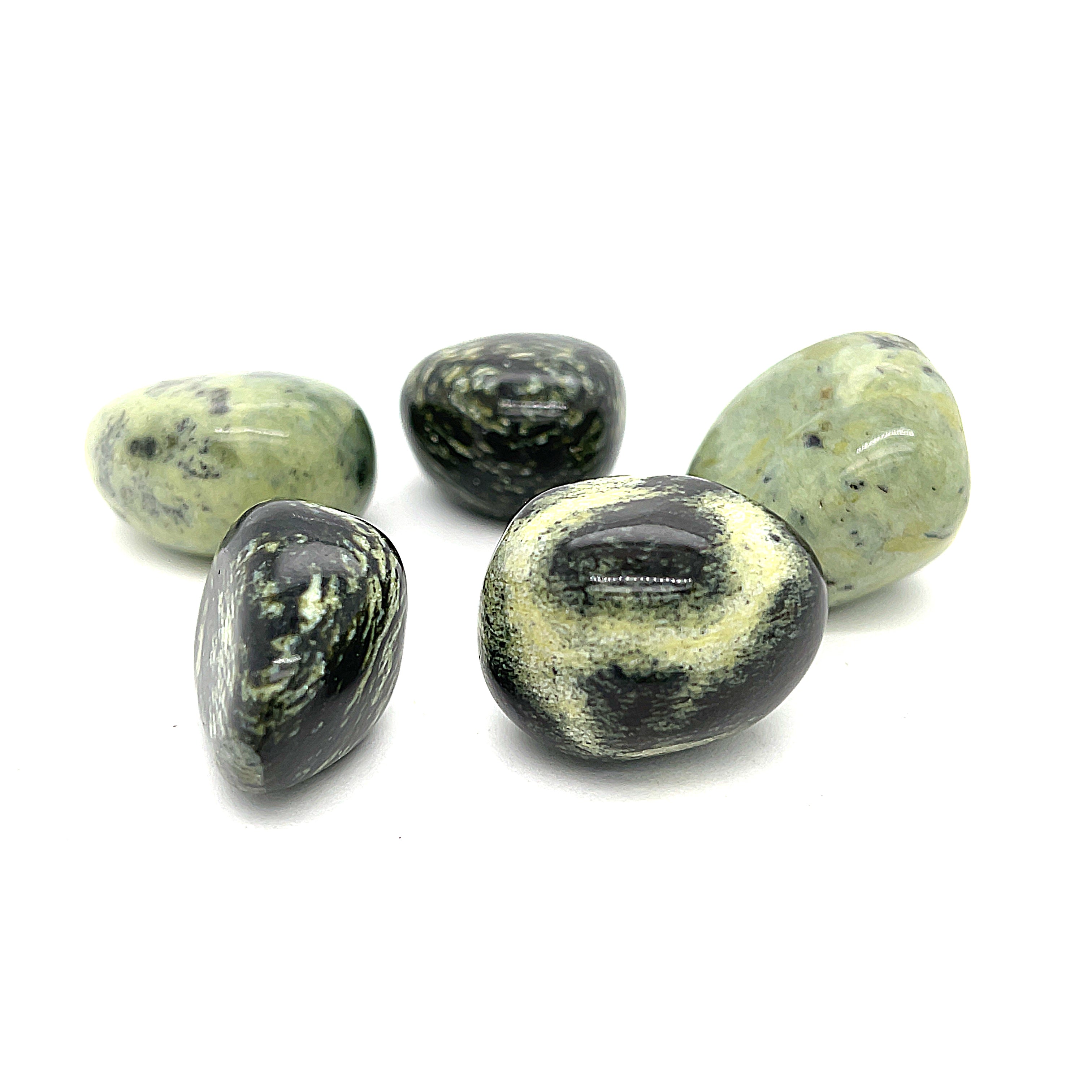 A collection of tumbled Chytha gemstones with a greenish hue, displayed on a white background, front overview. 